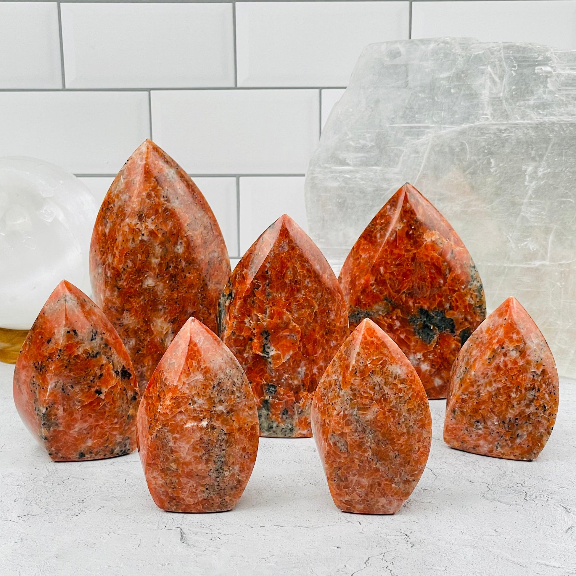 multiple flame towers displayed to show the differences in the sizes and color shades 