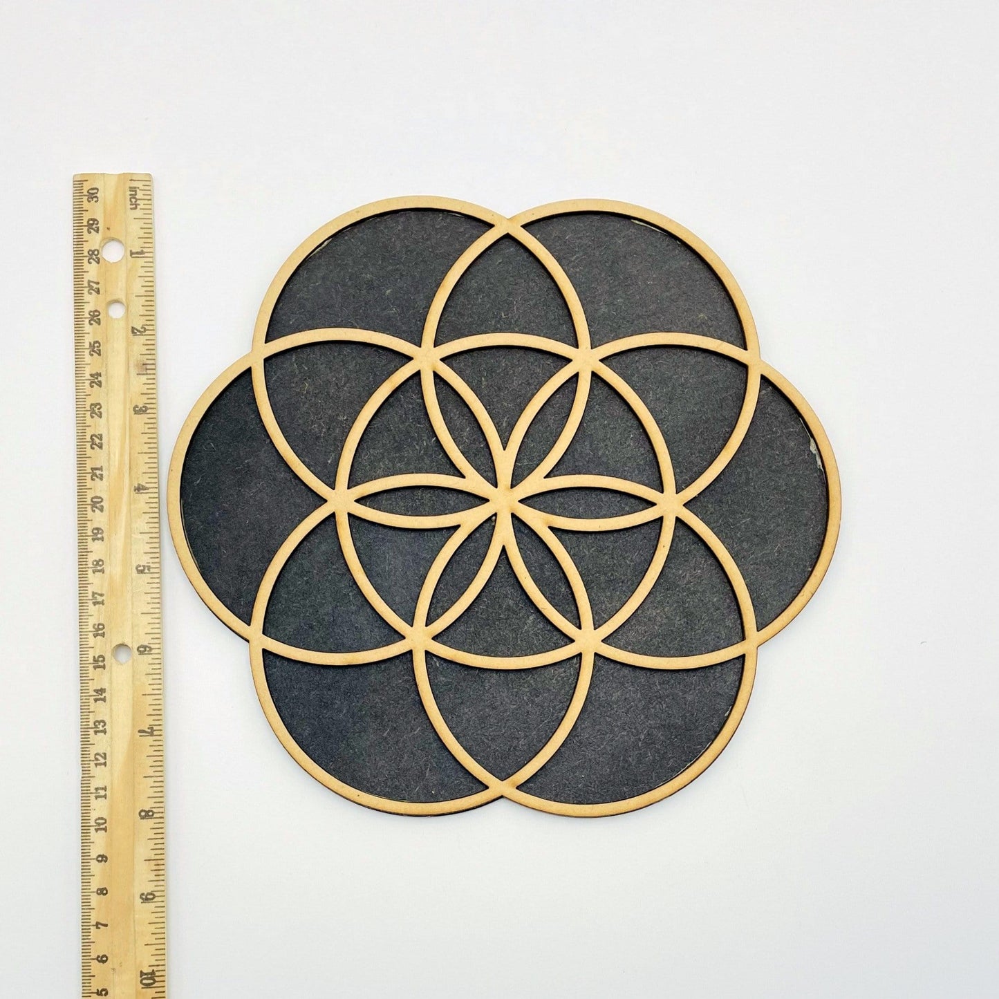seed of life wooden grid with ruler for size reference