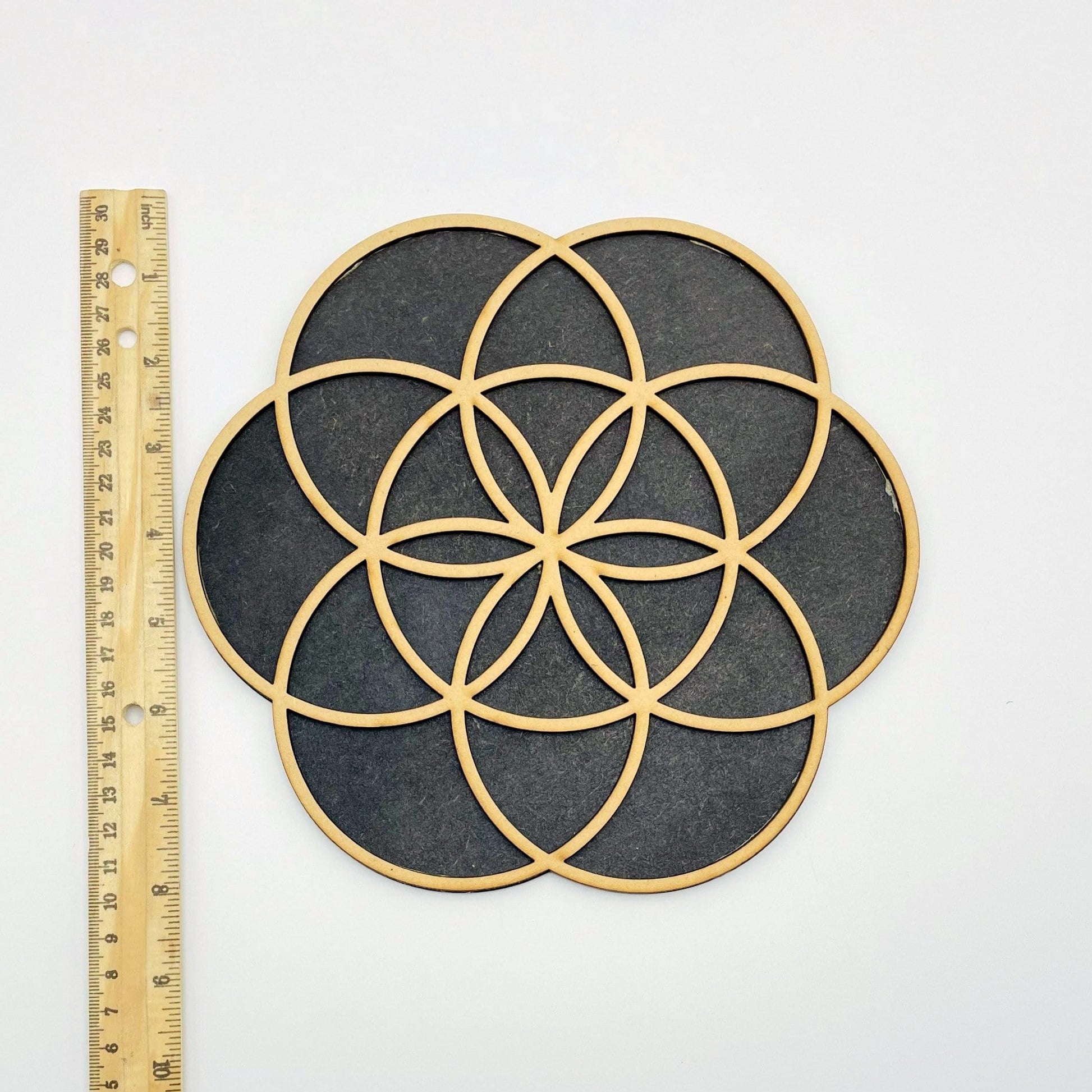 seed of life wooden grid with ruler for size reference