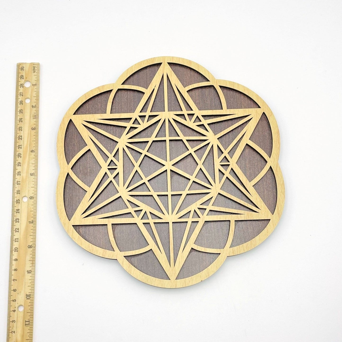 wooden grid next to ruler for size reference