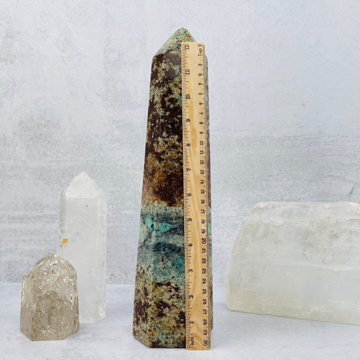Amazonite Polished Tower Point next to a ruler for size reference 