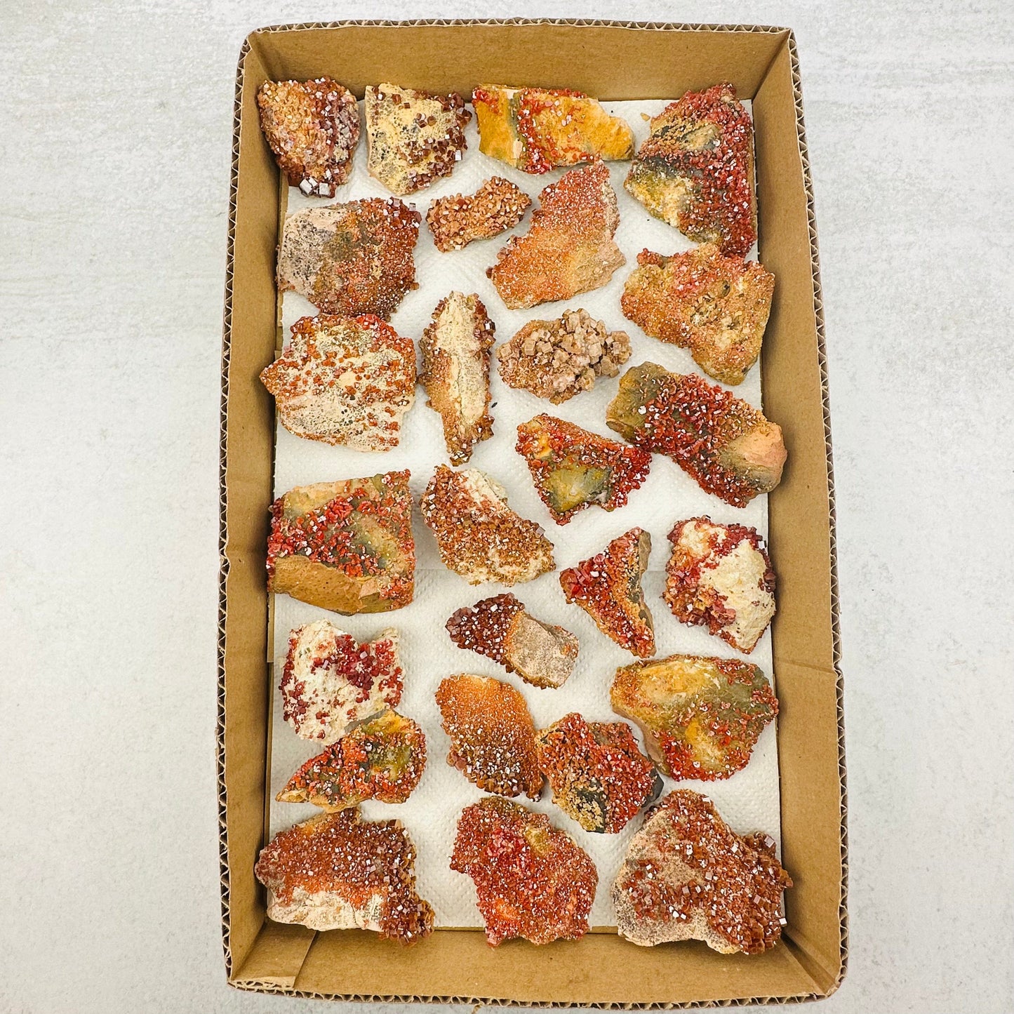you will receive one full flat box of Raw Vanadinite Specimen