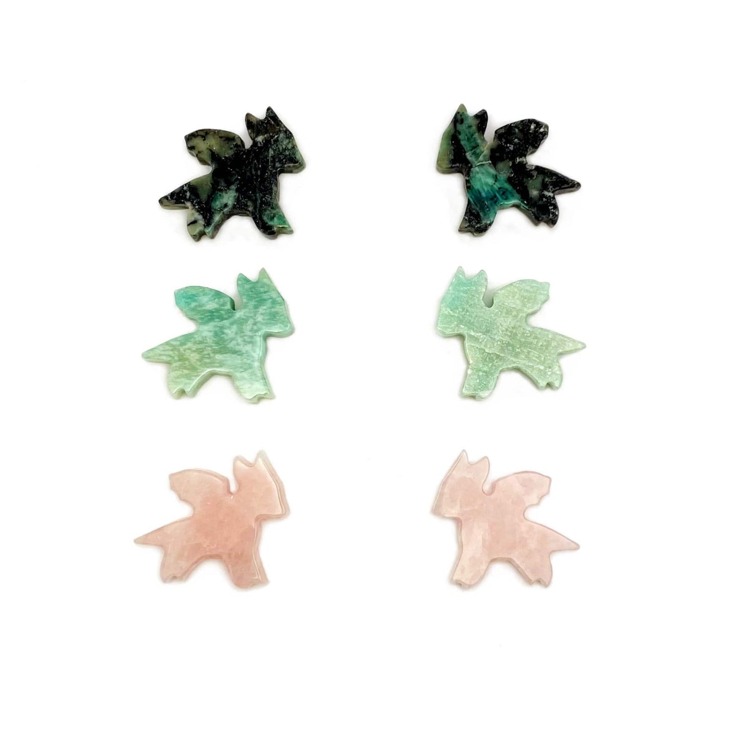 emerald  amazonite rose quartz dragons displayed on white background