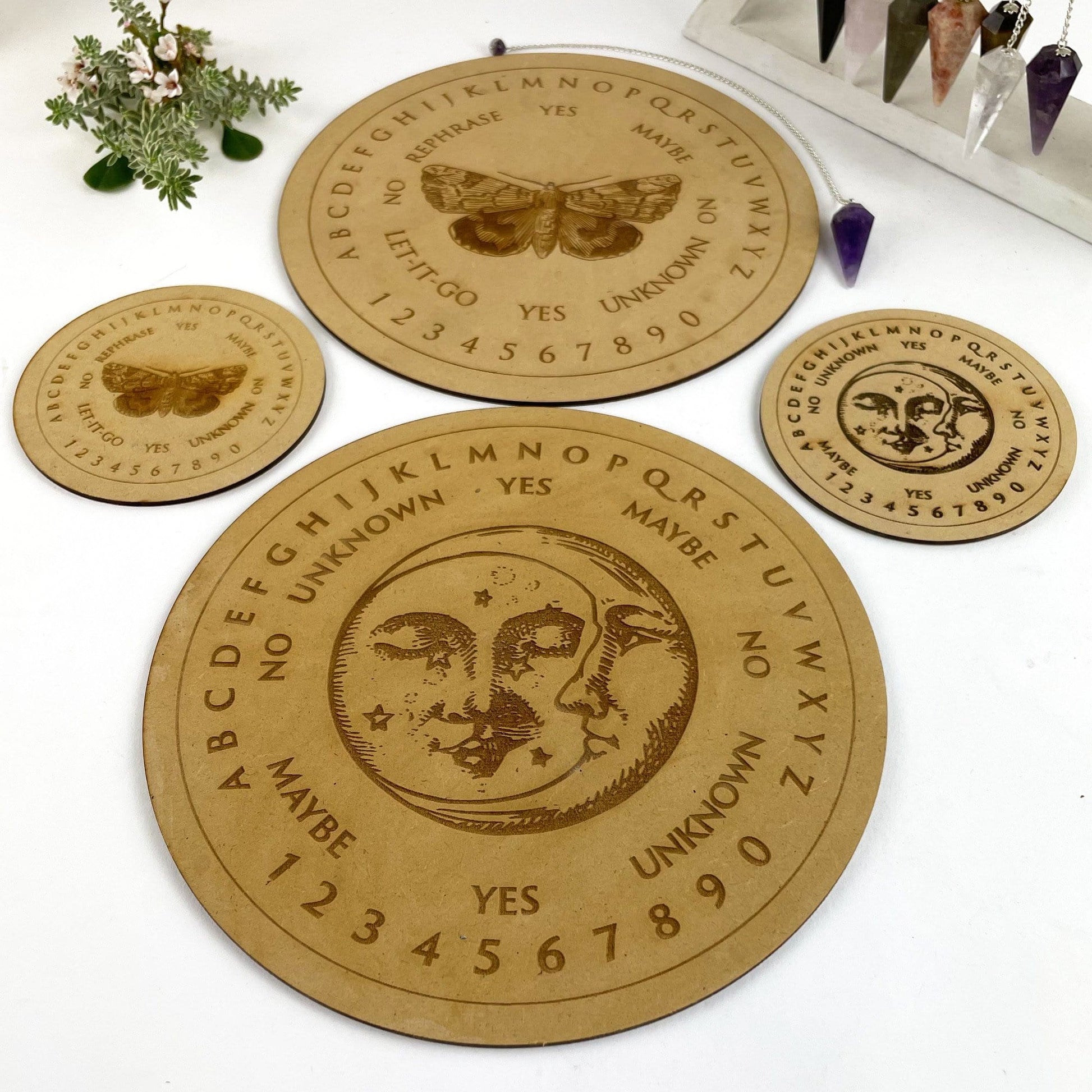 Pendulum Boards in 4" Moon and Sun Circle  8" Moon and Sun Circle 4" Butterfly Circle 8" Butterfly Circle Side view
