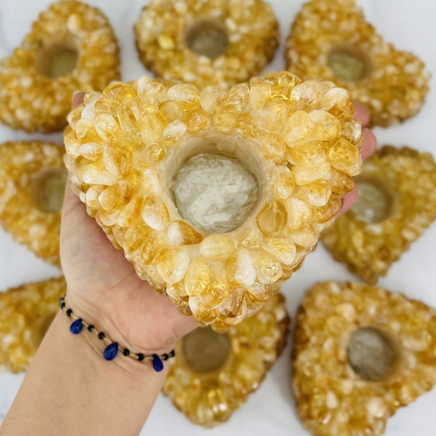 Citrine Tumbled stone Heart Candle Holder in a hand