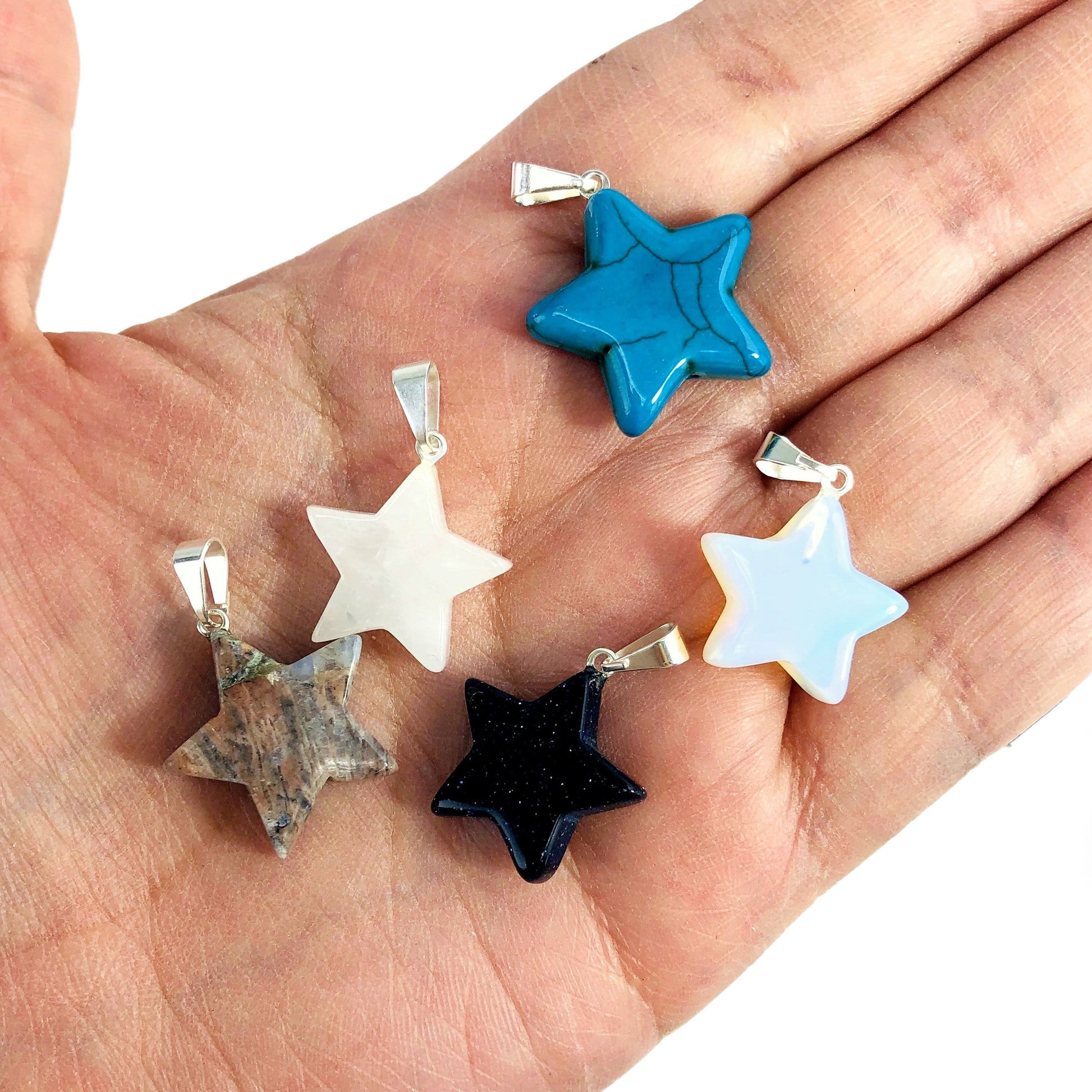 pendants in hand for size reference 