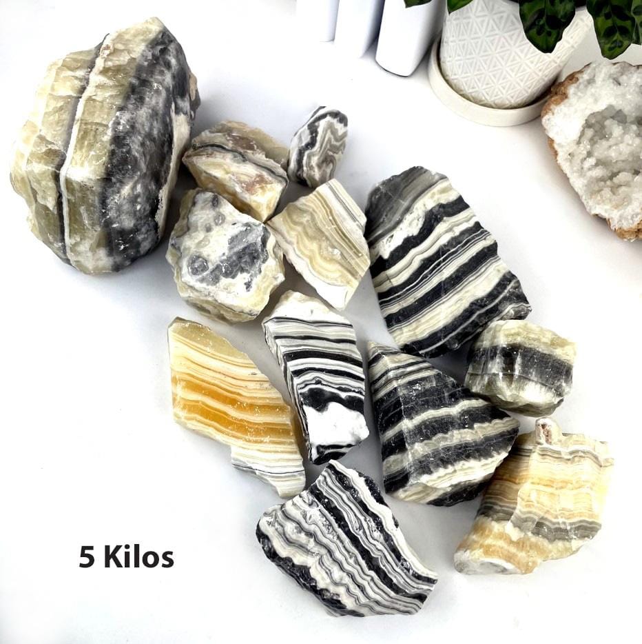 5 kilos worth of Mexican onyx laid out on a table as display.