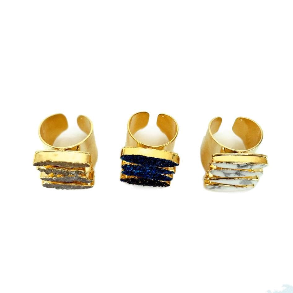 Top view of the Adjustable Teardrop Druzy Ring with Electroplated 24k Gold Adjustable Cigar Band in colors Natural Druzy, Mystic Blue Titanium Druzy, White Howlite