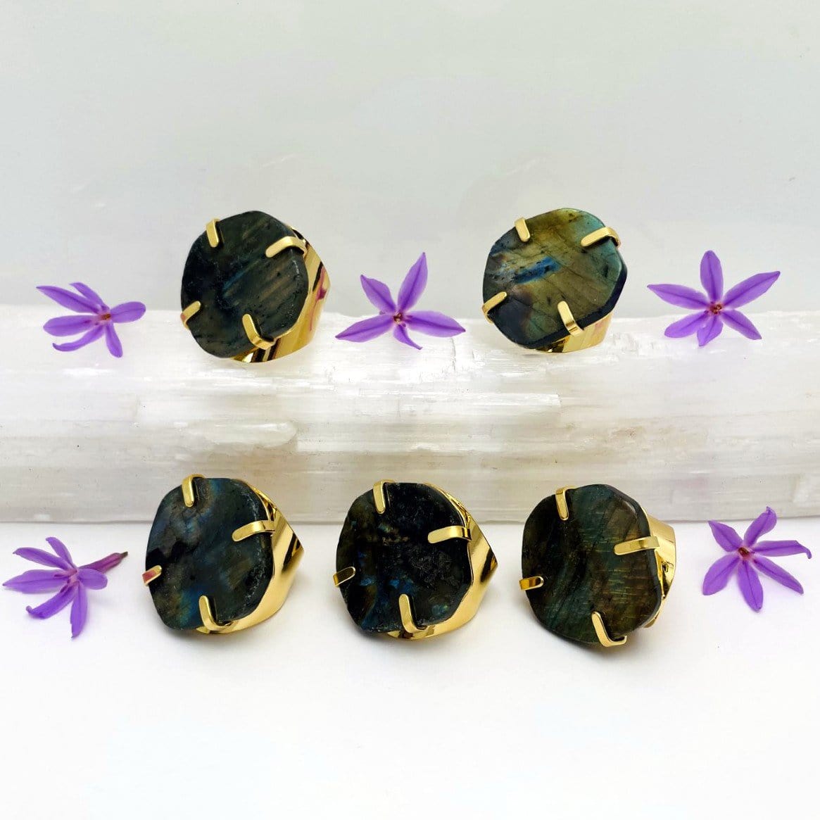 rings displayed to show color variation in the labradorite stone