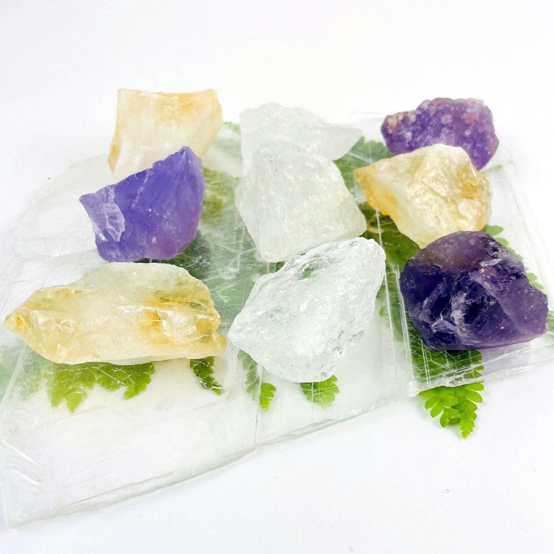 Amethyst, Quartz, and Citrine showing stock up close