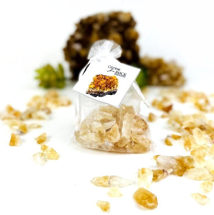 rough citrine crystals tied and tagged in an organza bag
