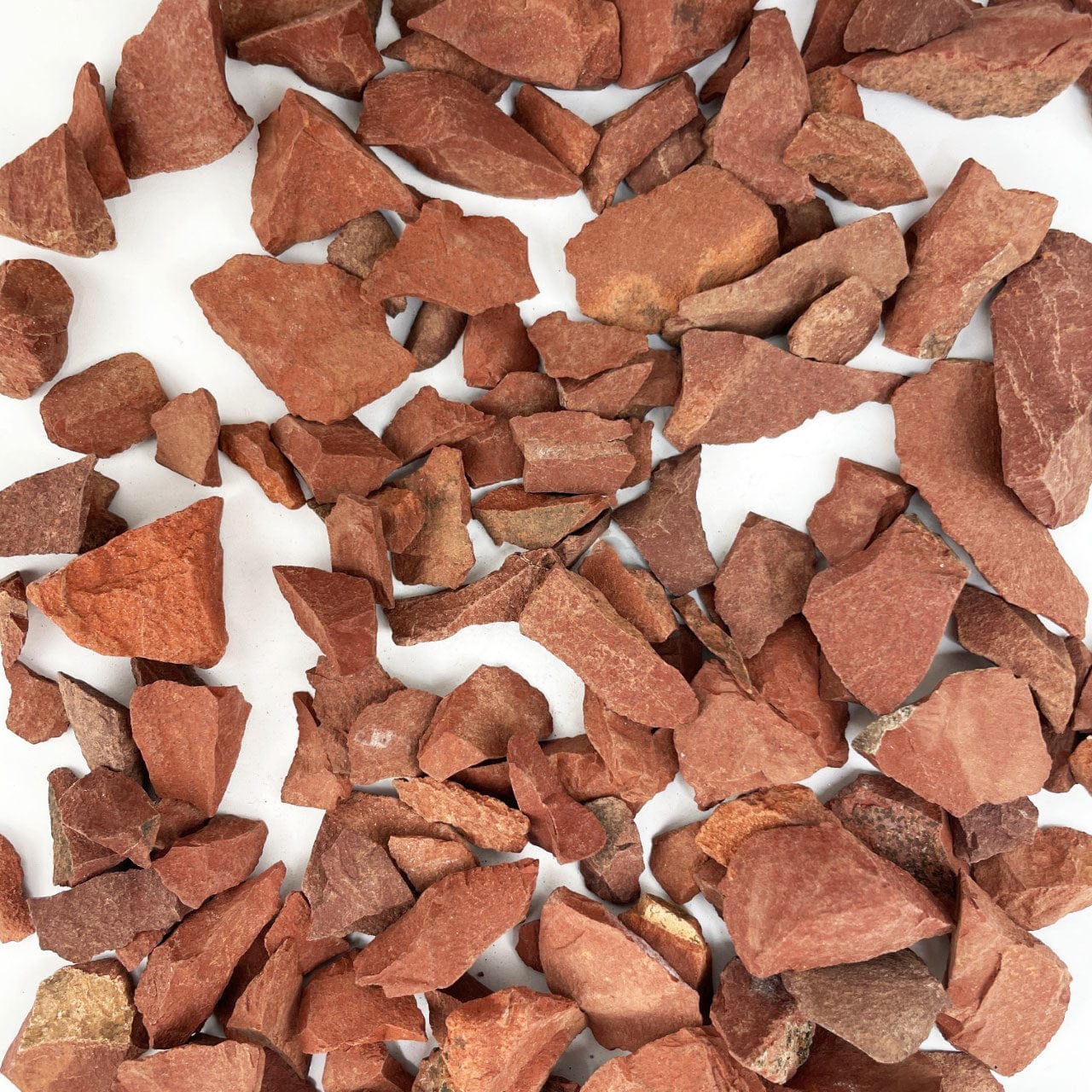 Red Jasper Stones spread on a table