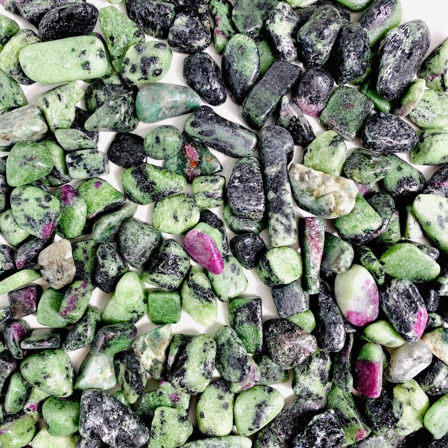 ruby zoisite chips on white background