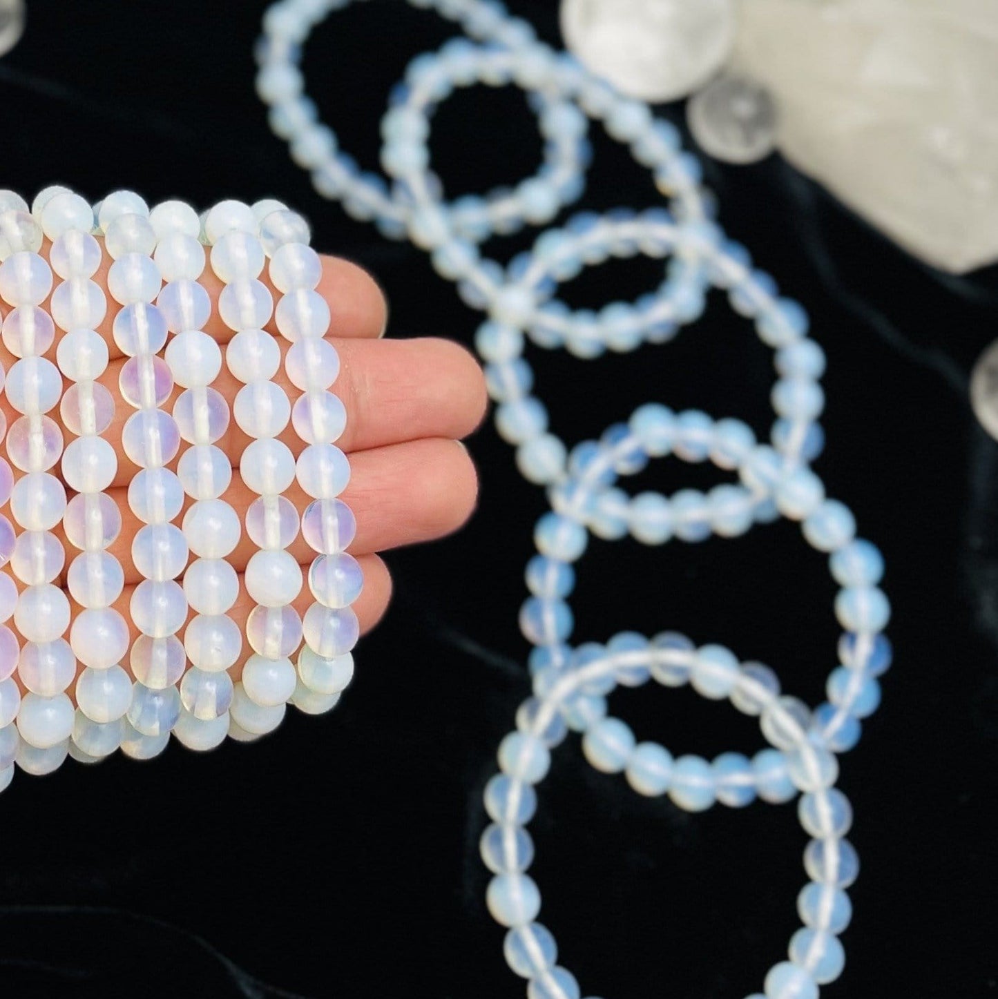 Opalite Round Bead Bracelets - several around a hand
