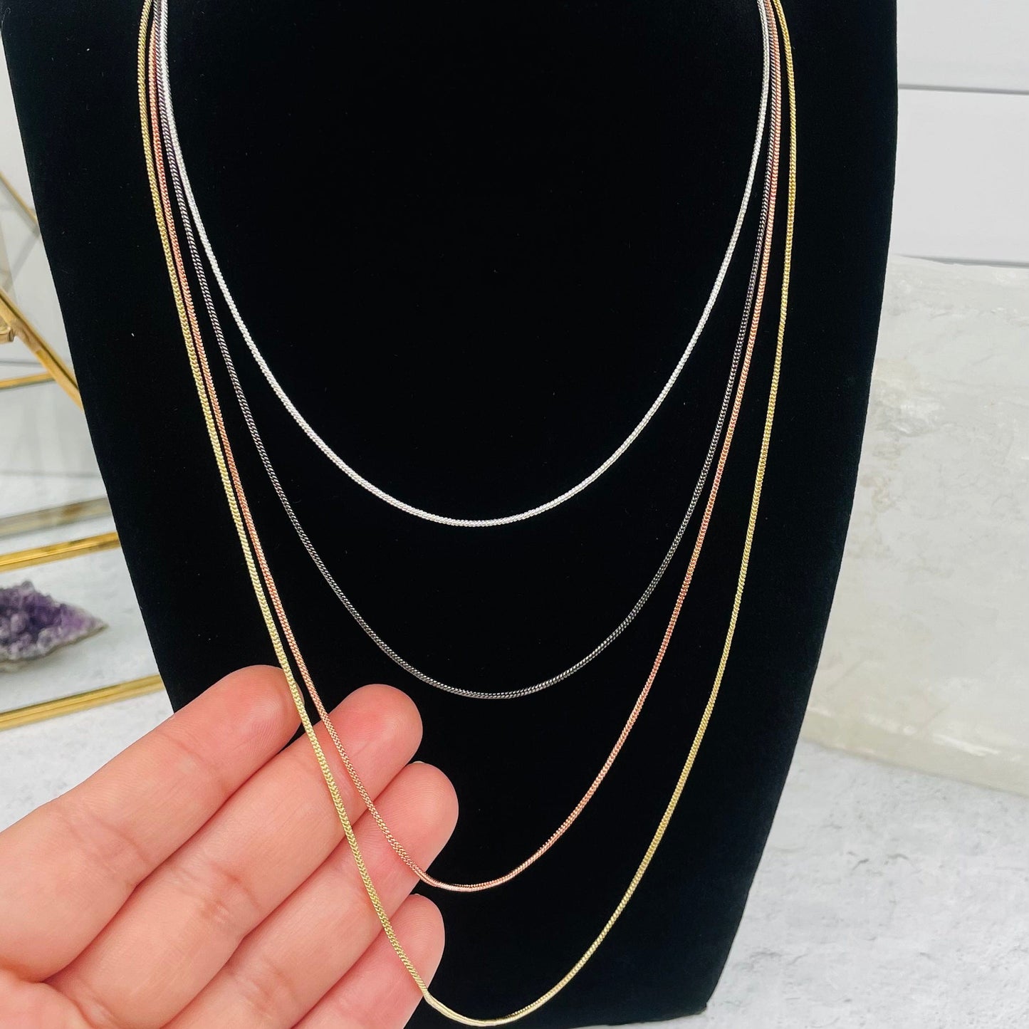Snake Chain Necklace in hand for size reference 