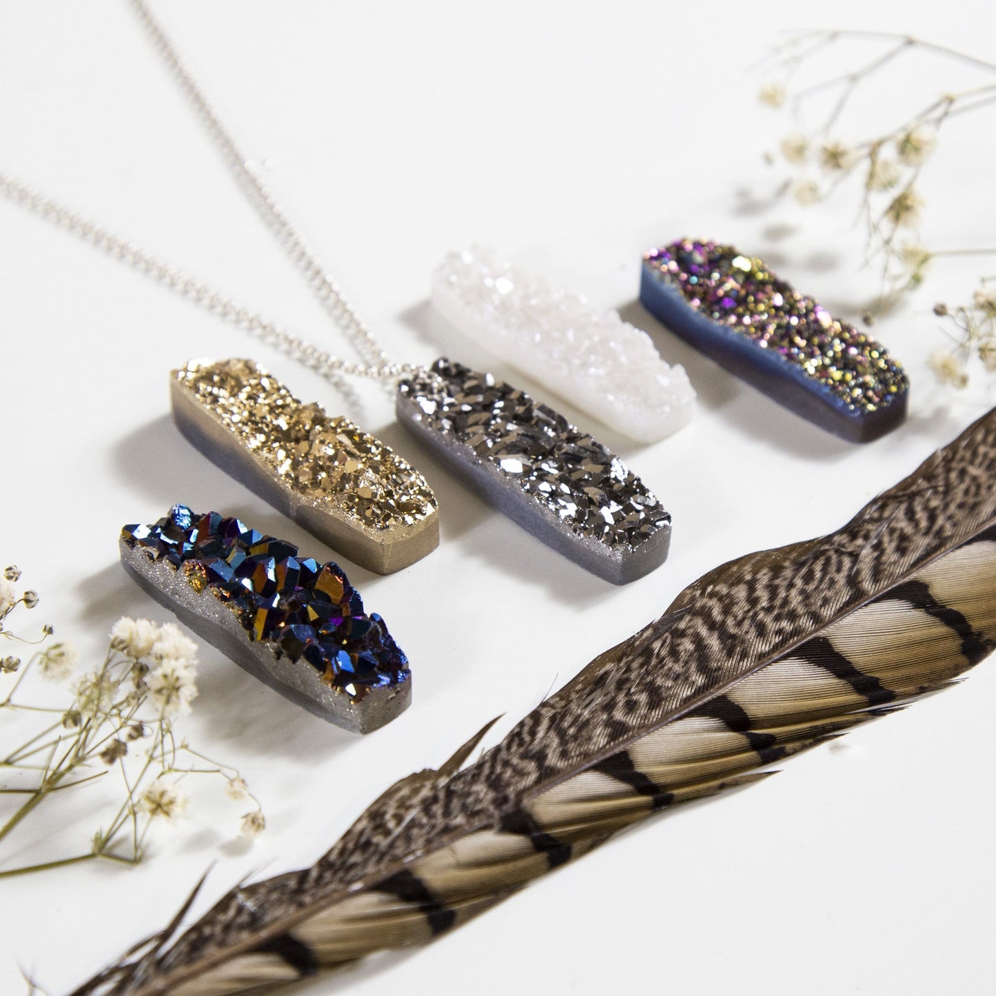 druzy bar drilled bead with decorations in the background