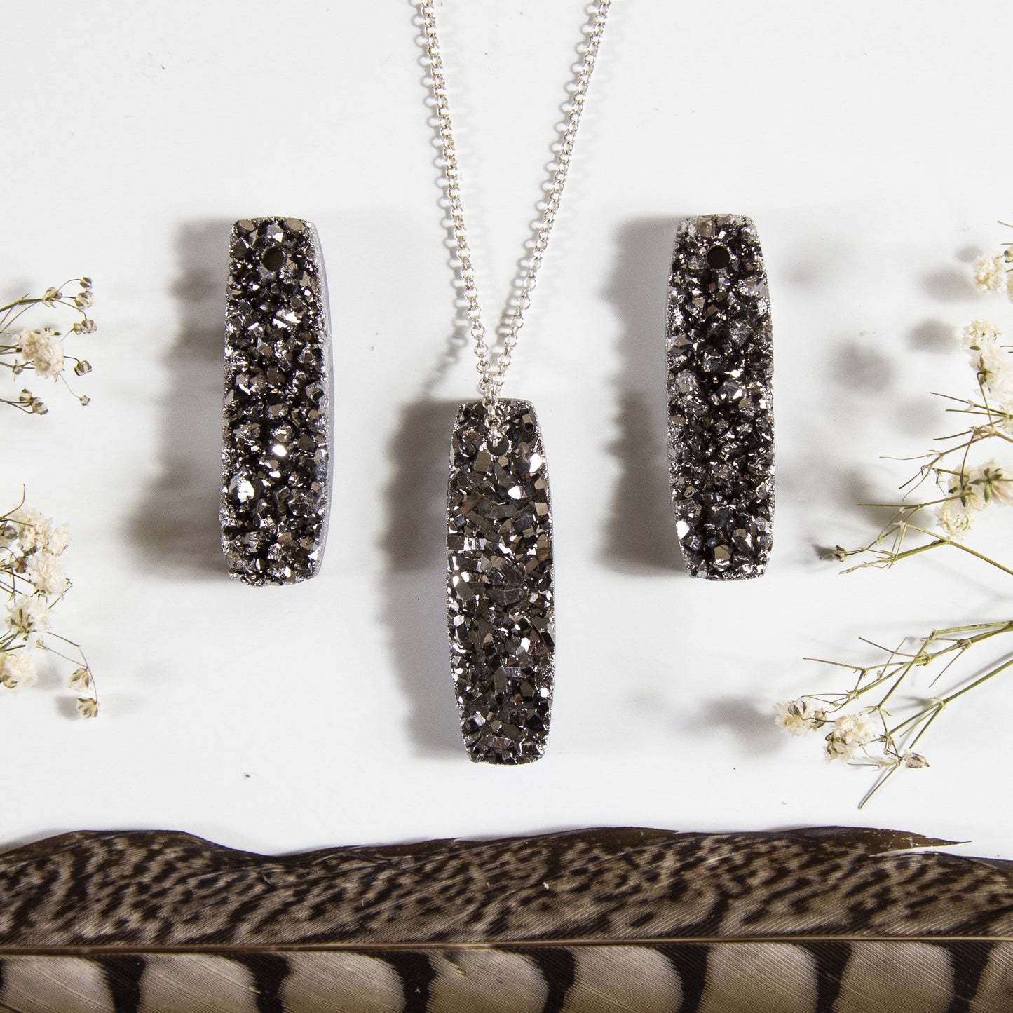 druzy bare drilled bead with decorations in the background