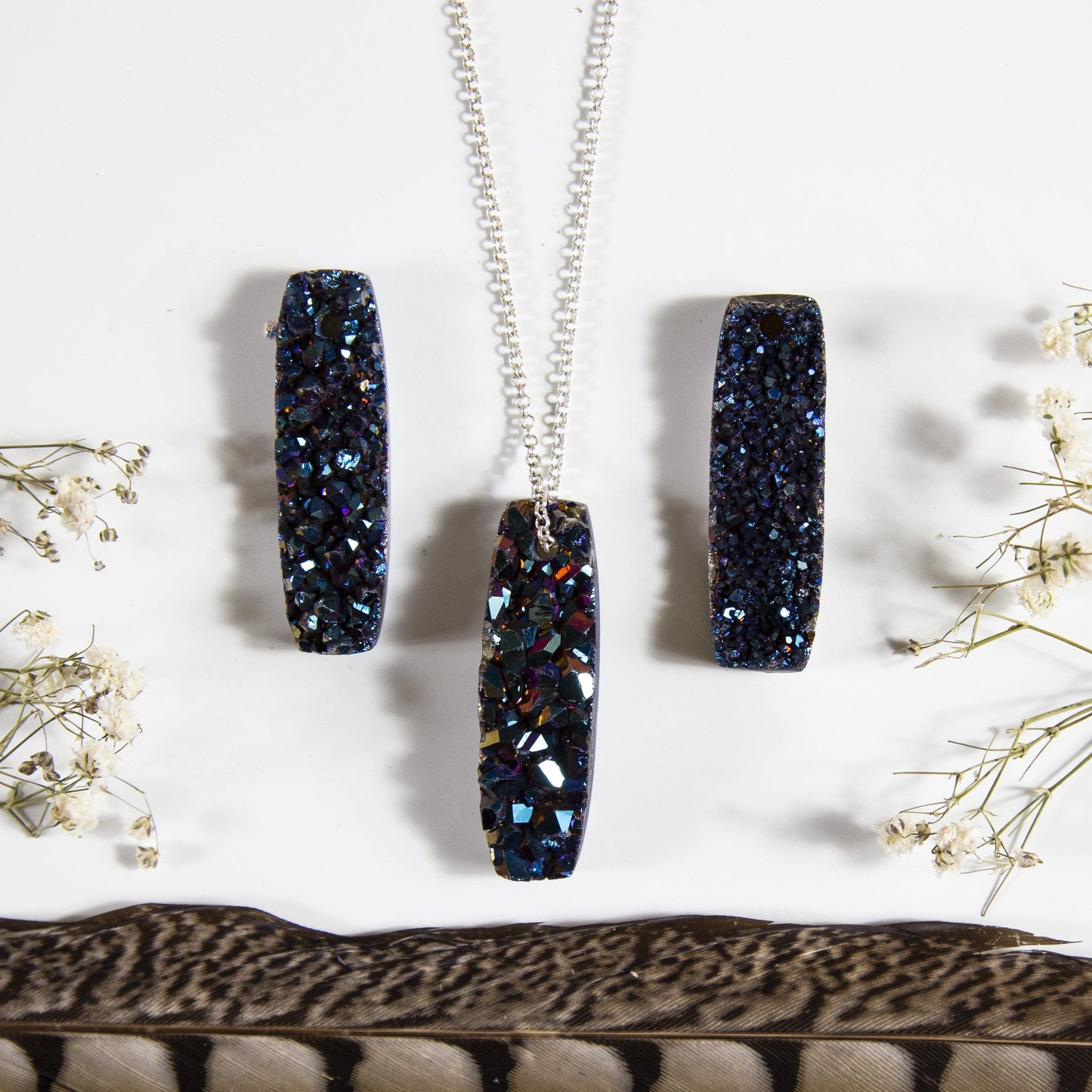 druzy drilled bead with decorations in the background