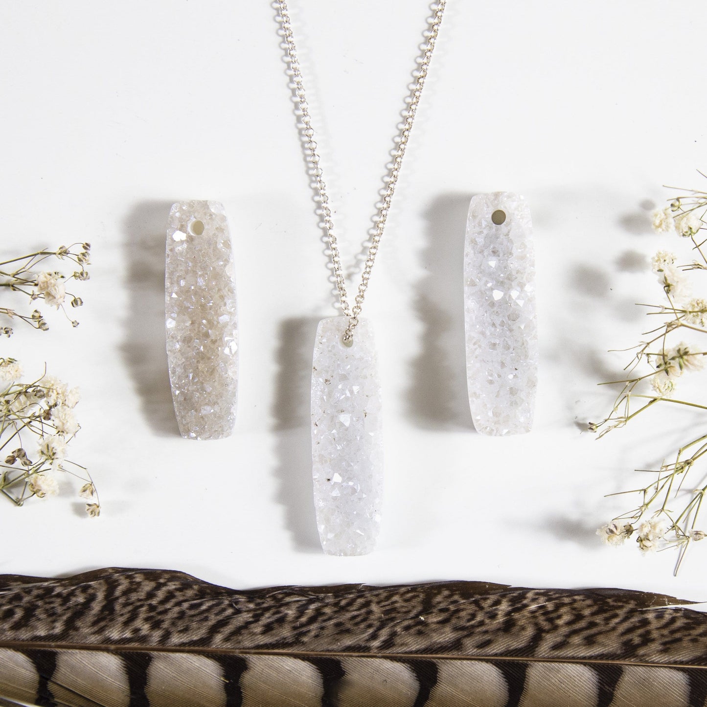 druzy drilled bead with decorations in the background