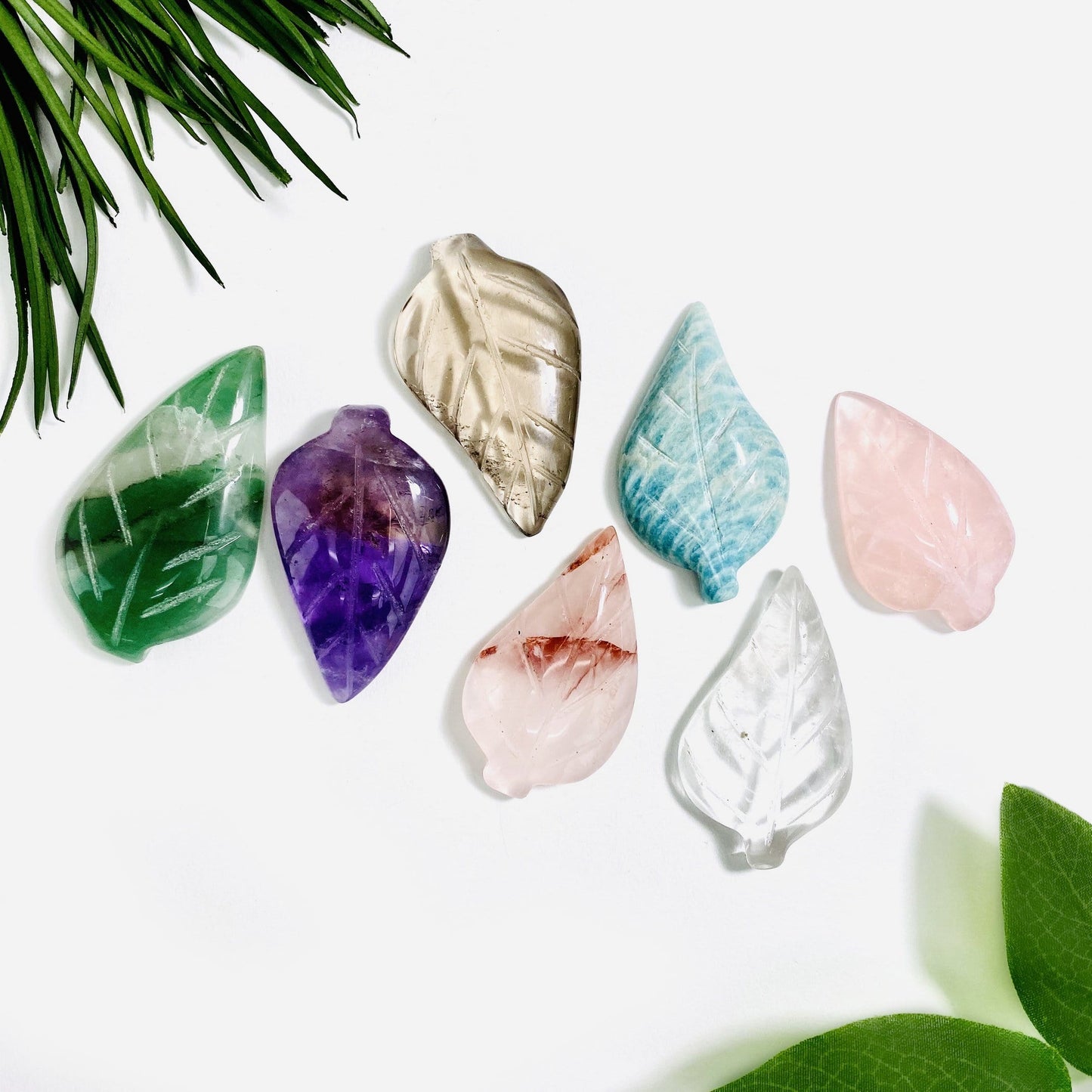 Gemstone Leaf is all available stones, on display on a table