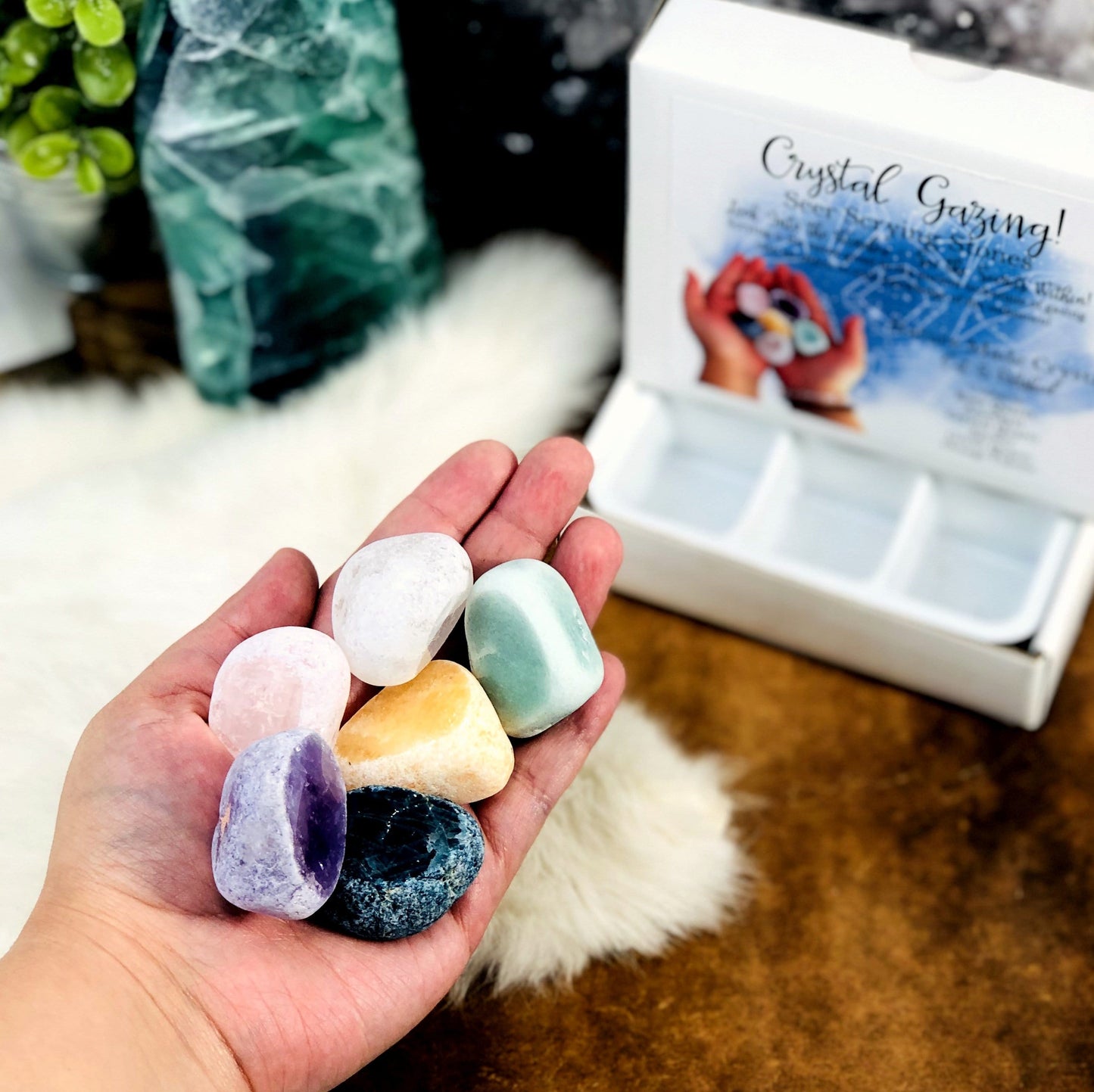 crystal gazing seer scrying stone set in hand for size reference