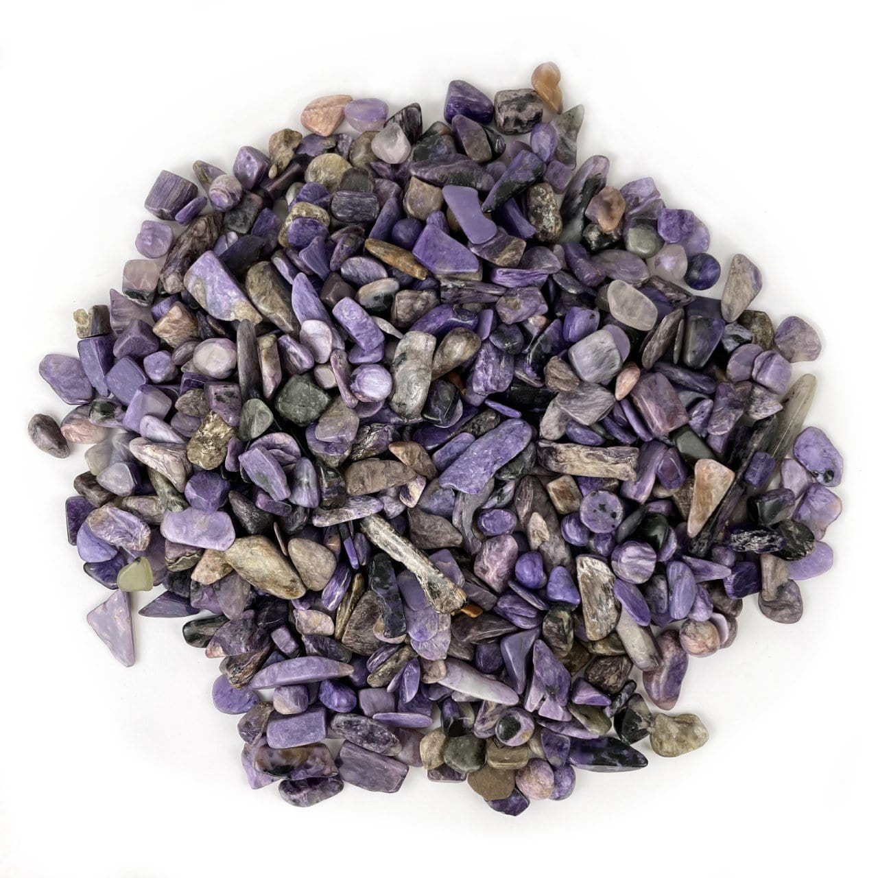 Charoite 1lb Chips laid out in a circle formation on white background 