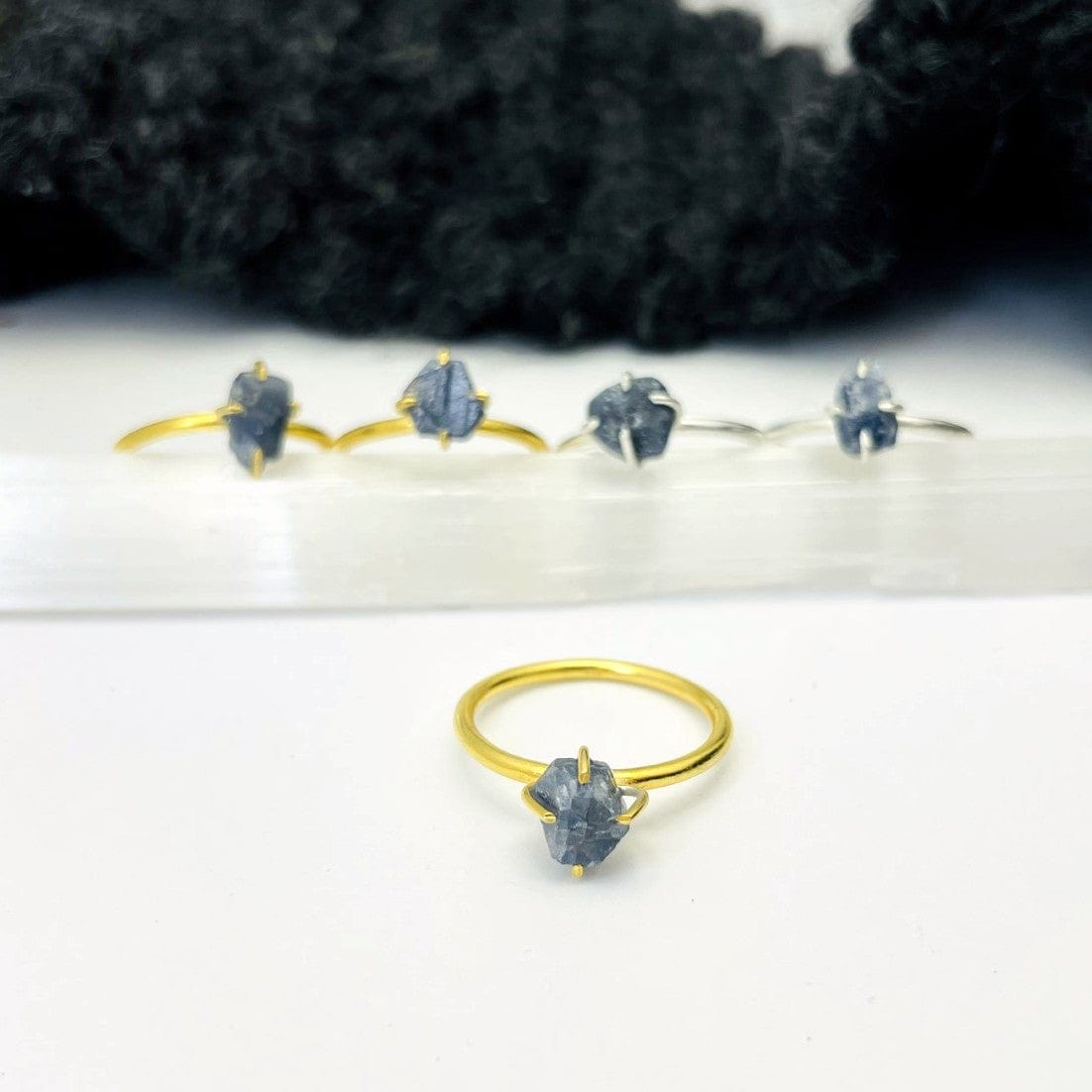 close up of the details on the sapphire rings. They come in sterling silver and gold over sterling silver 