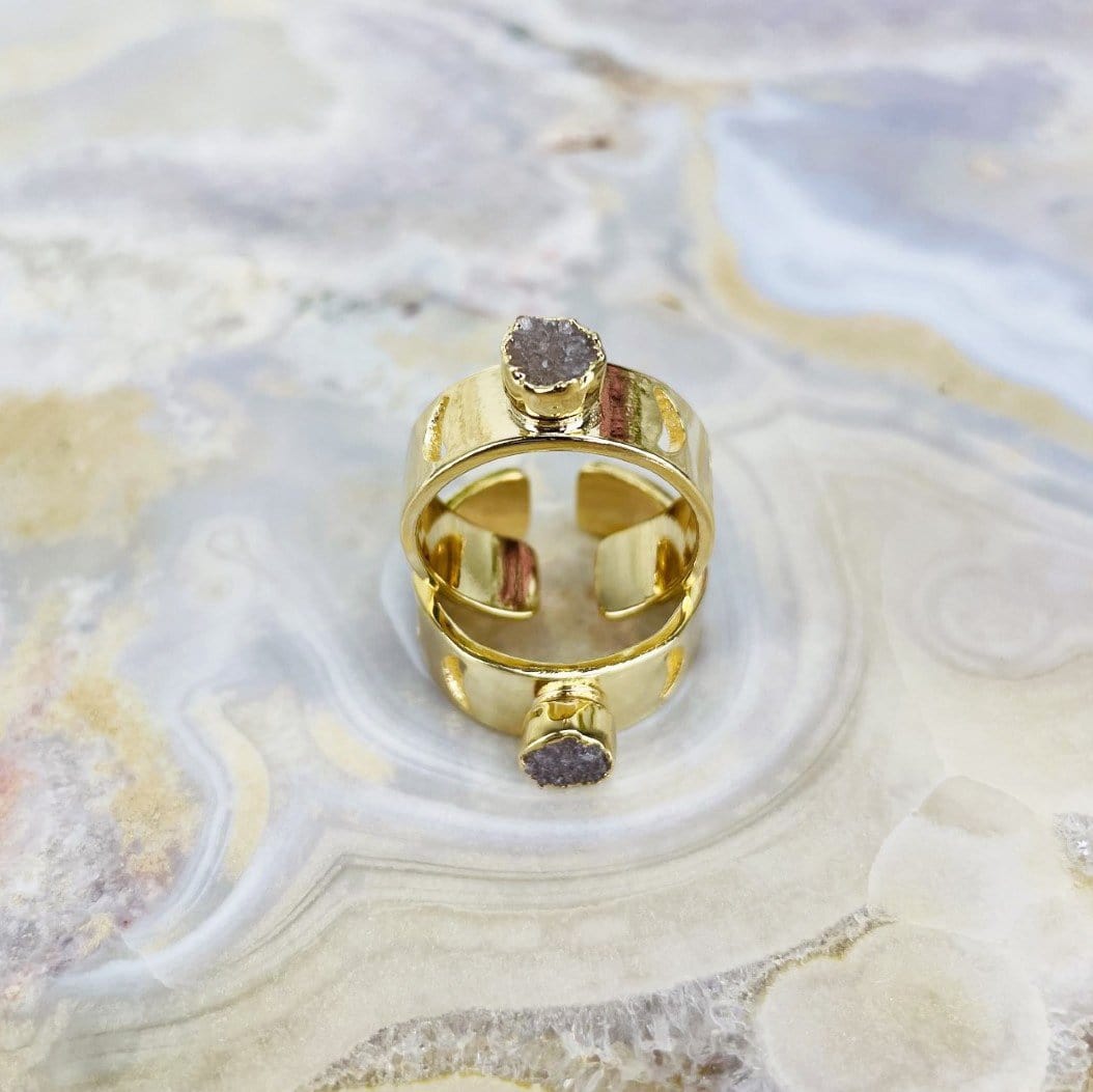 moon phase druzy ring on agate background
