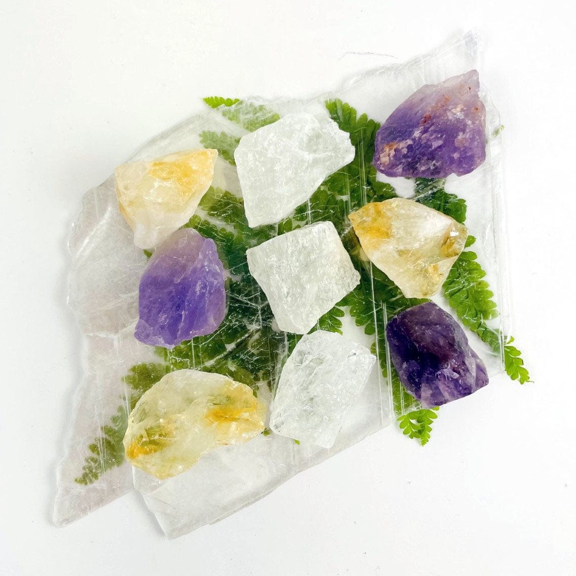 Amethyst, Quartz, and Citrine rough stones showing sizes and shapes and colors of stock