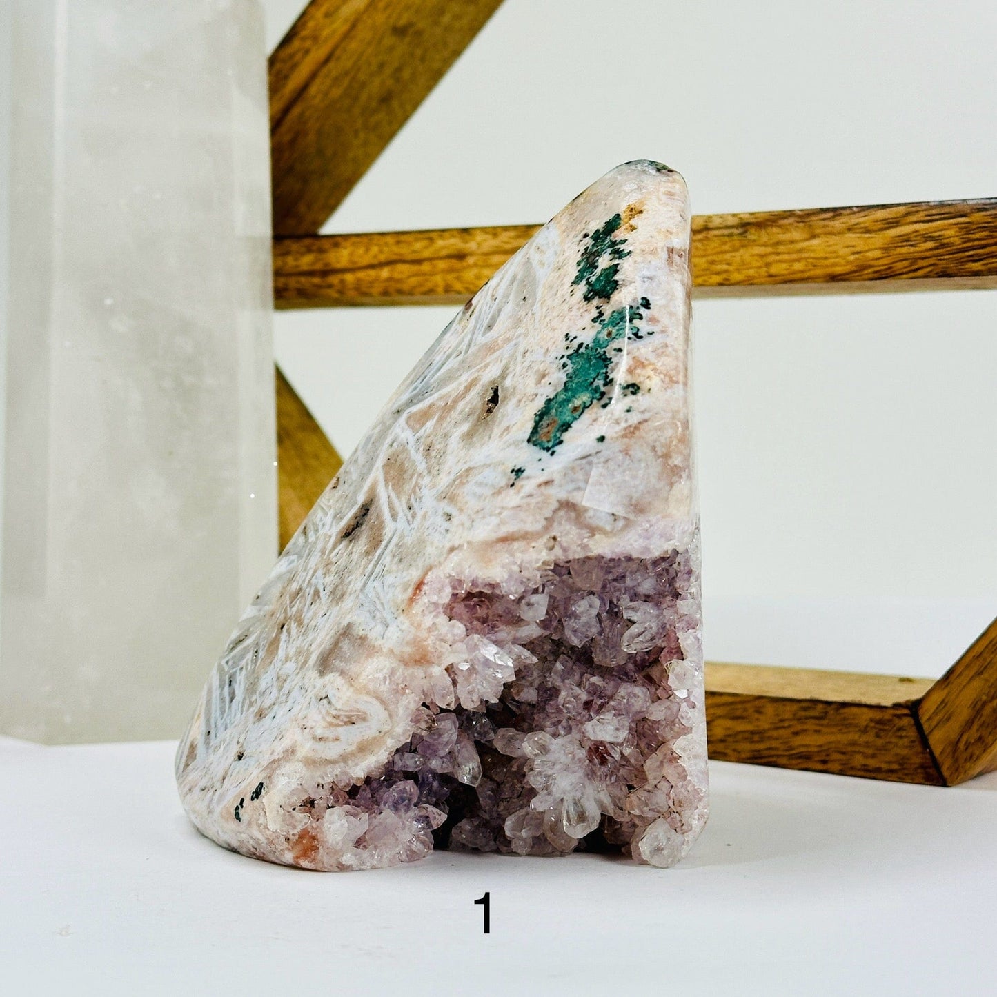 pink amethyst with decorations in the background