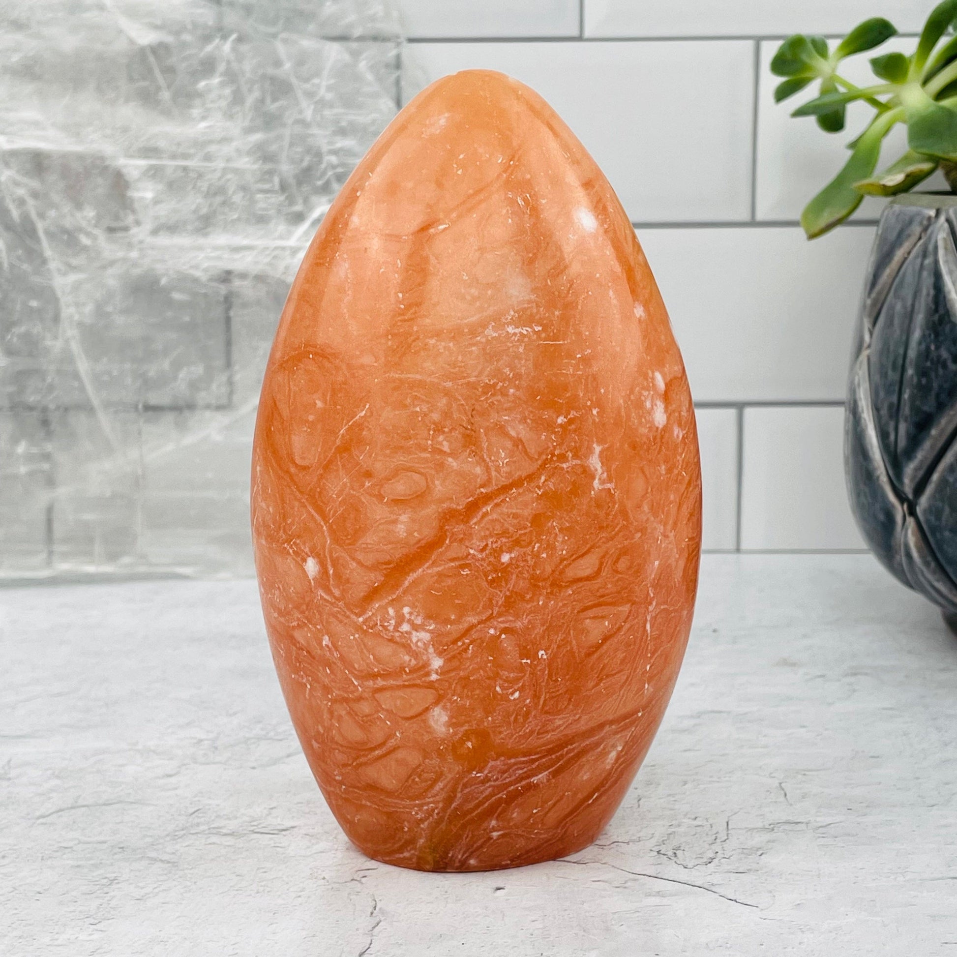 Peach Aventurine Cut Base displayed as home decor 