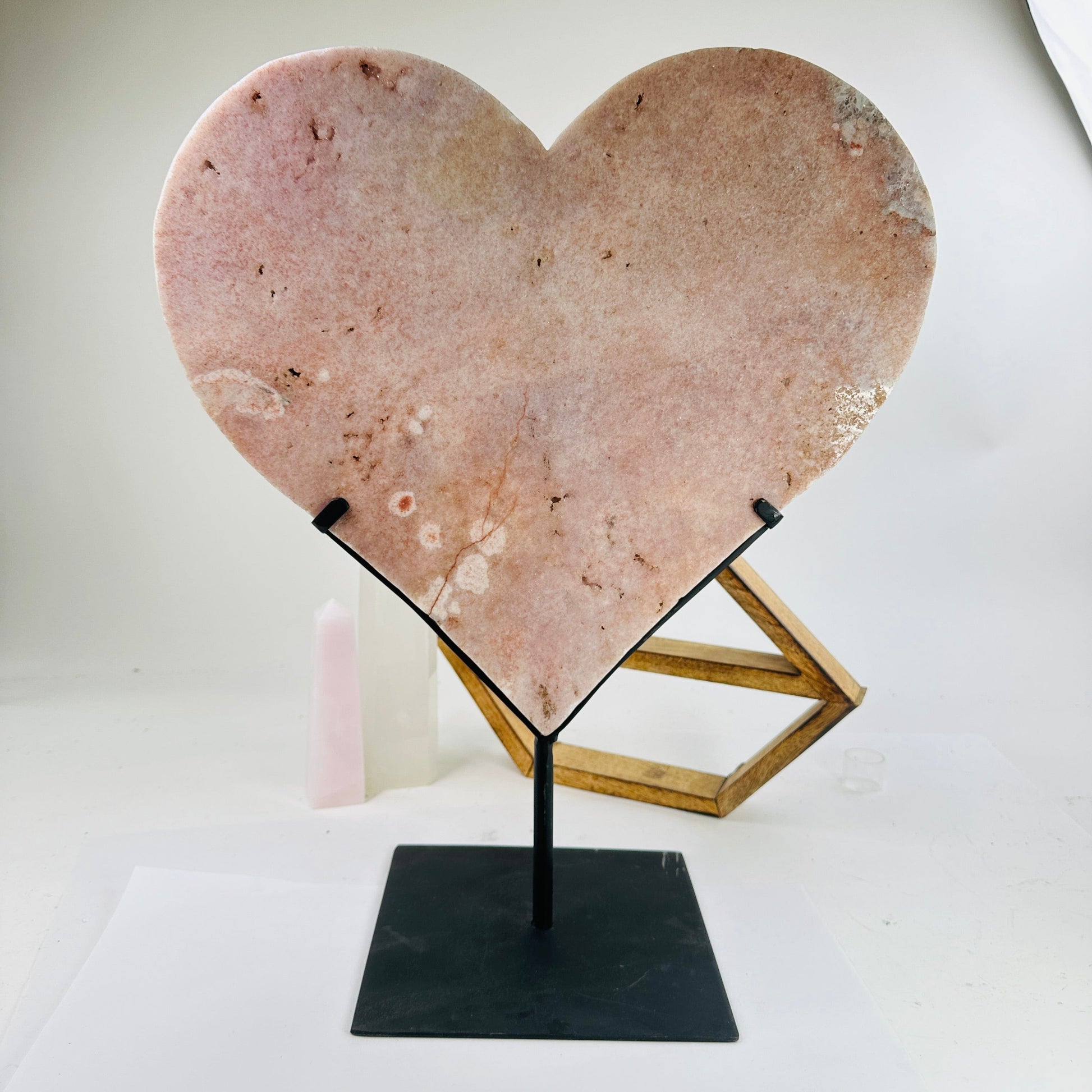 pink amethyst hearts with decorations in the background