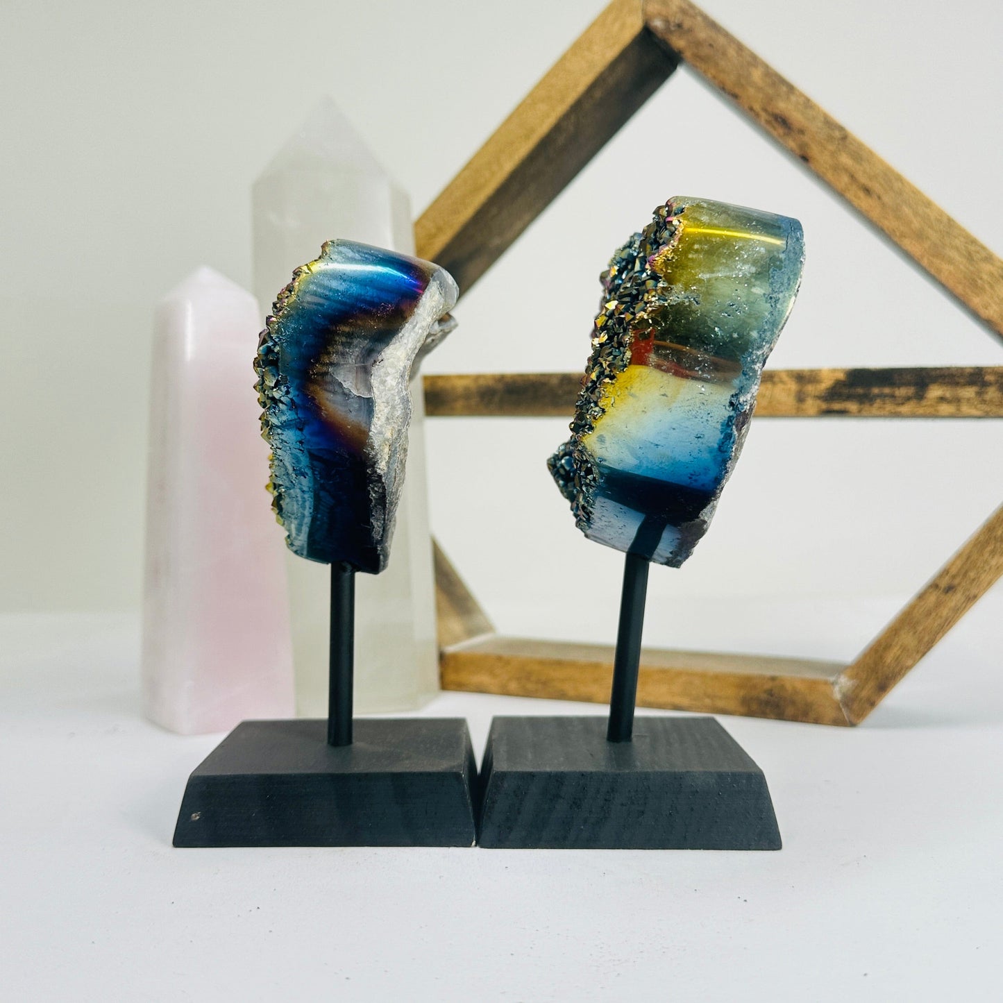titanium coated heart on stand with decorations in the background