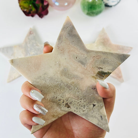 Pink Amethyst Large Crystal Star - You Choose variant 2 in hand for size reference with other variants in the background