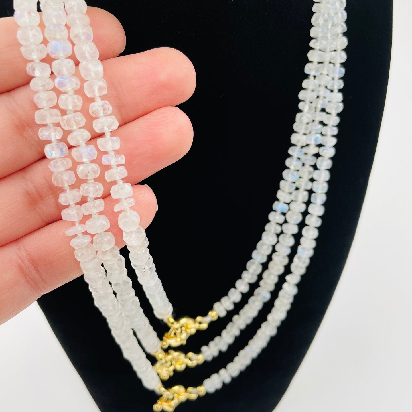 close up of the faceted rondelle beads on the necklace 