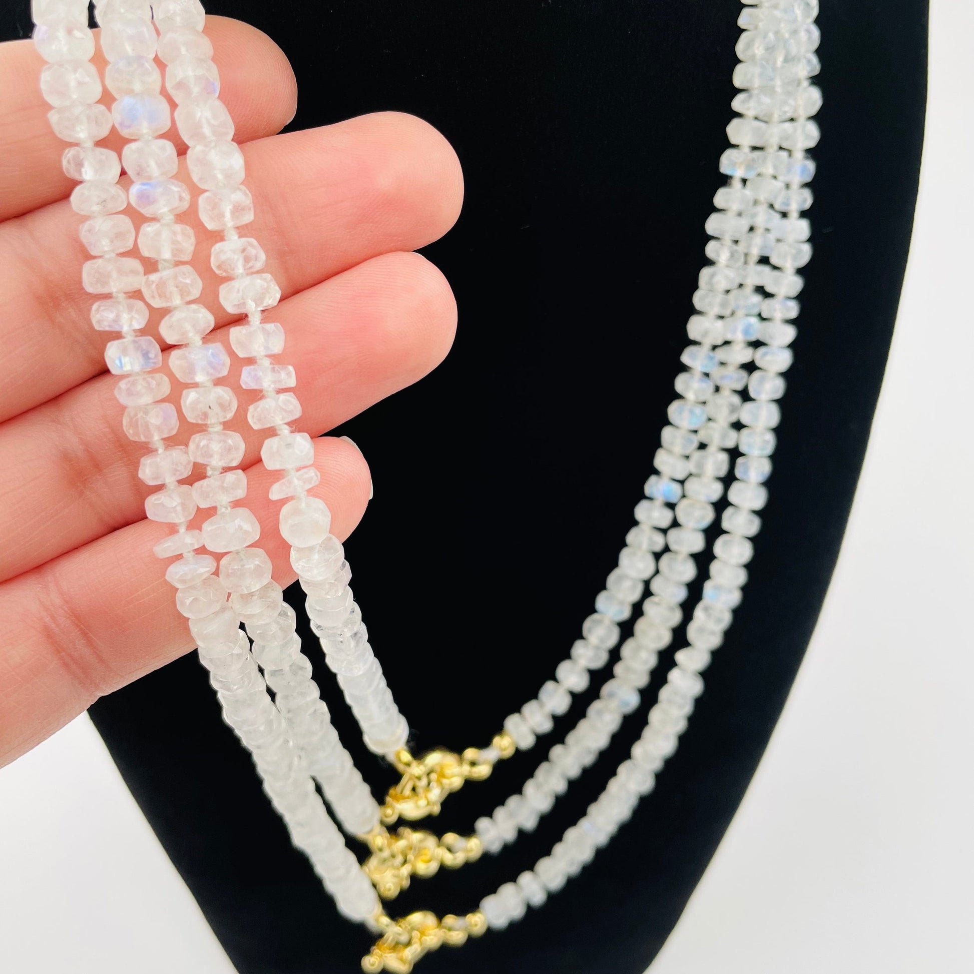 close up of the faceted rondelle beads on the necklace 