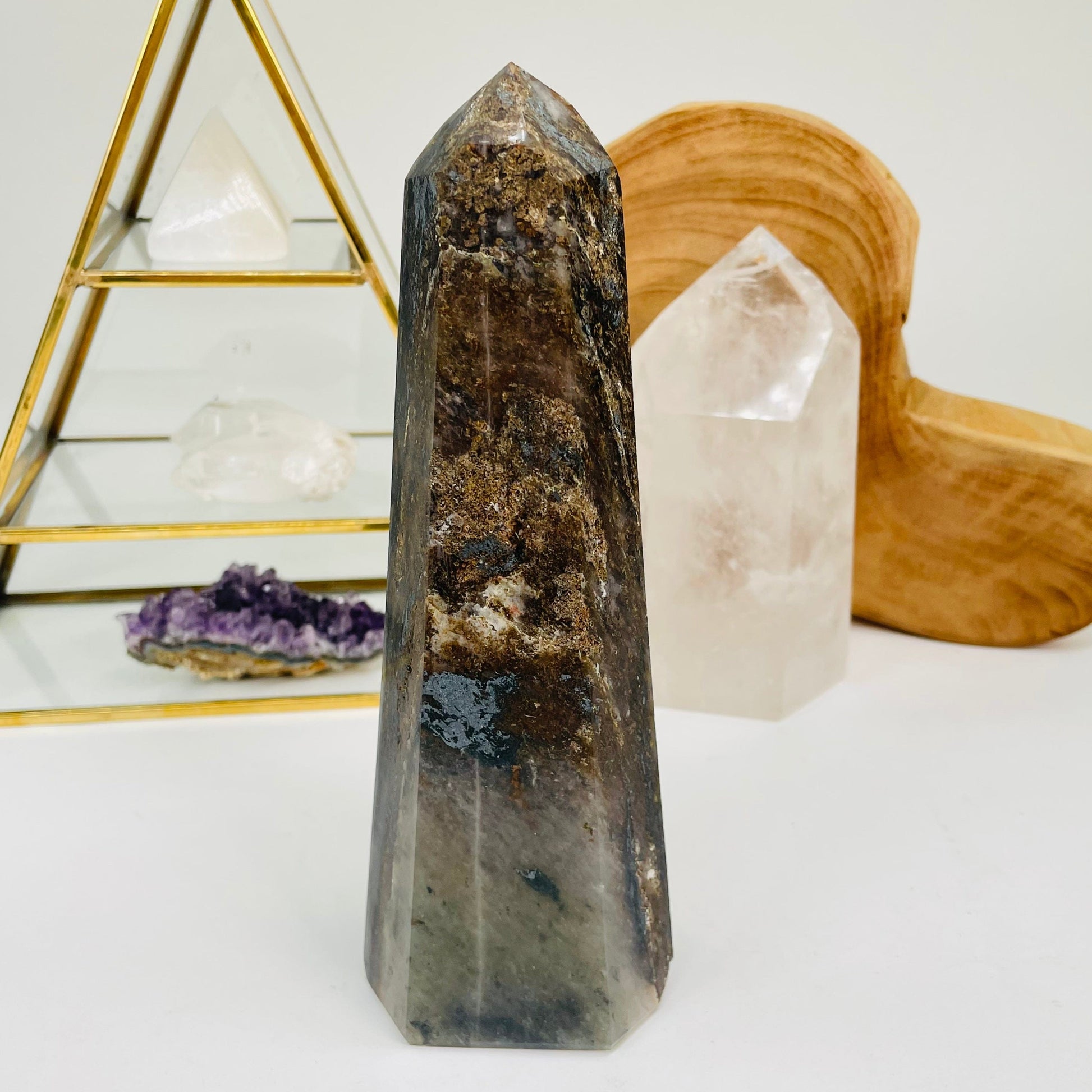 hematite in quartz point set as home decor