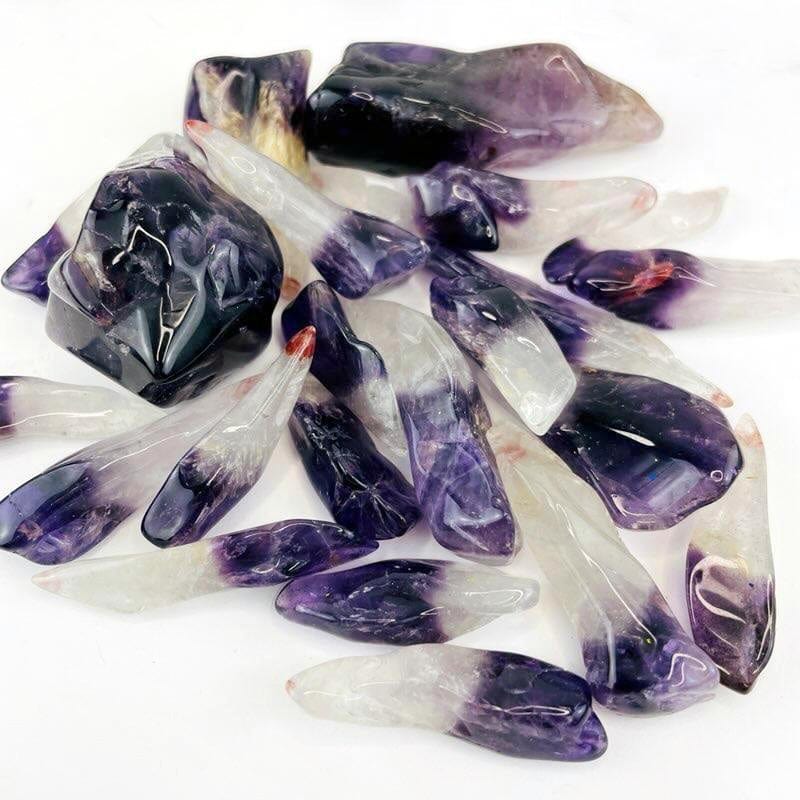 Polished Amethyst Points up close showing size and shape variation