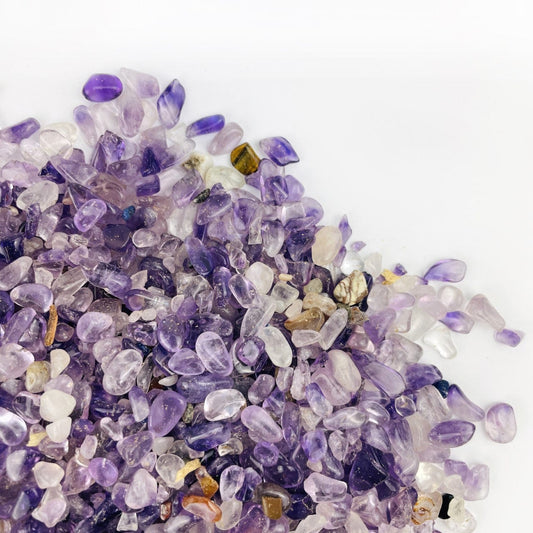  Amethyst Polished Small Chip Stones on a table up close