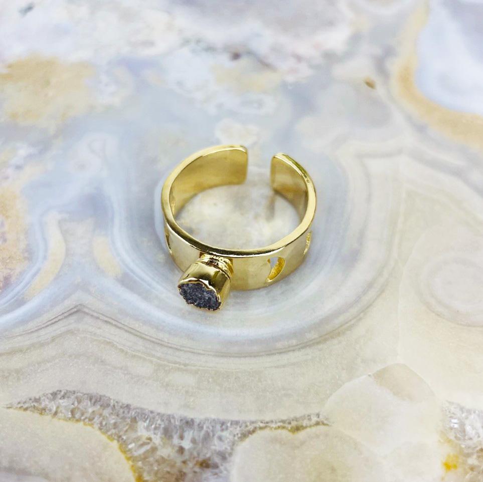 moon phase druzy ring on agate background
