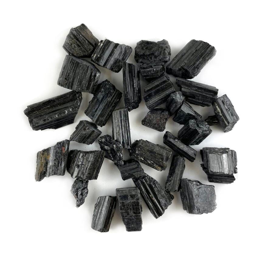 Black Tourmaline in the Small Pendant size on a table