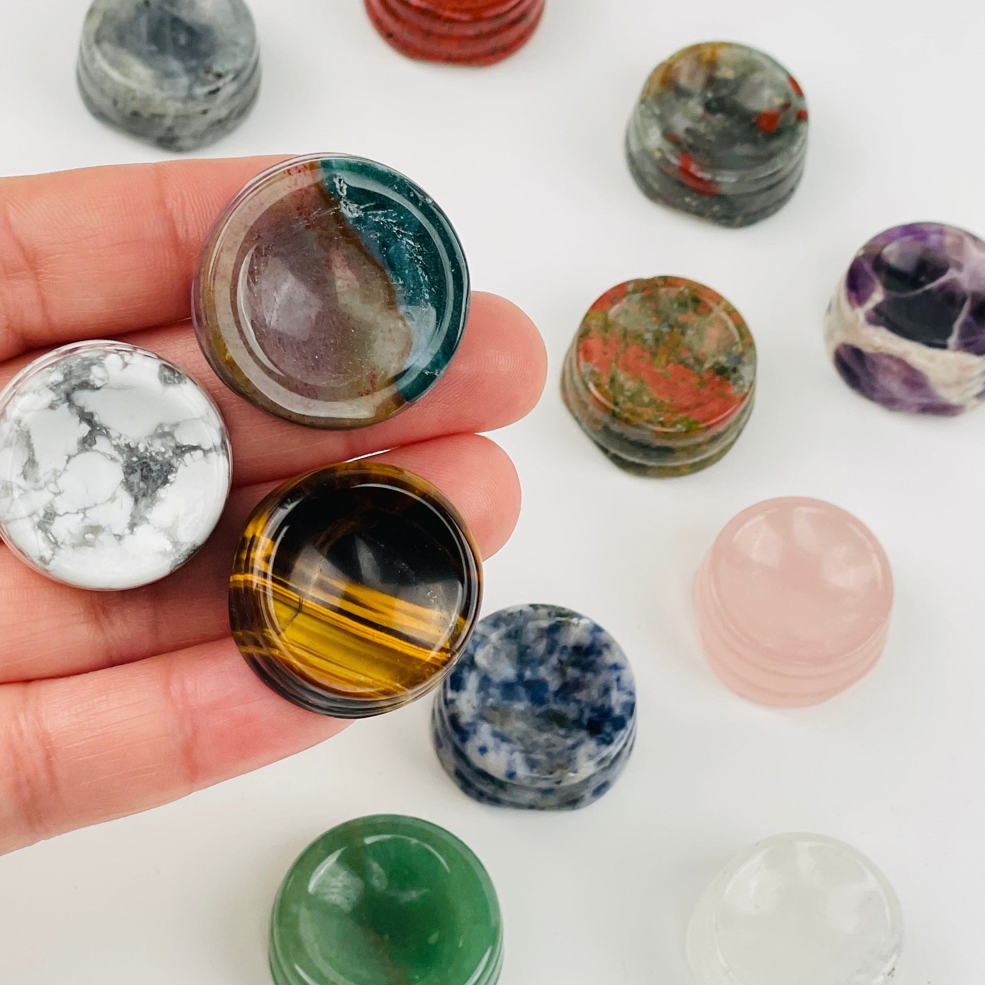 close up of come sphere holders showing the details on the stone 