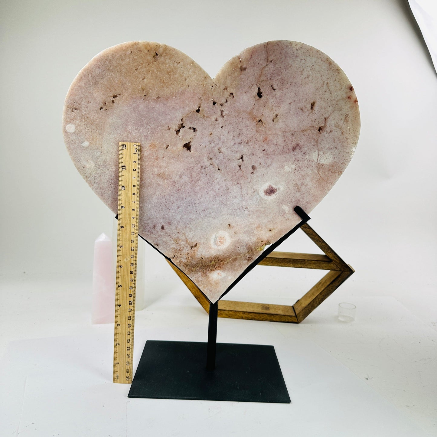 pink amethyst hearts with decorations in the background