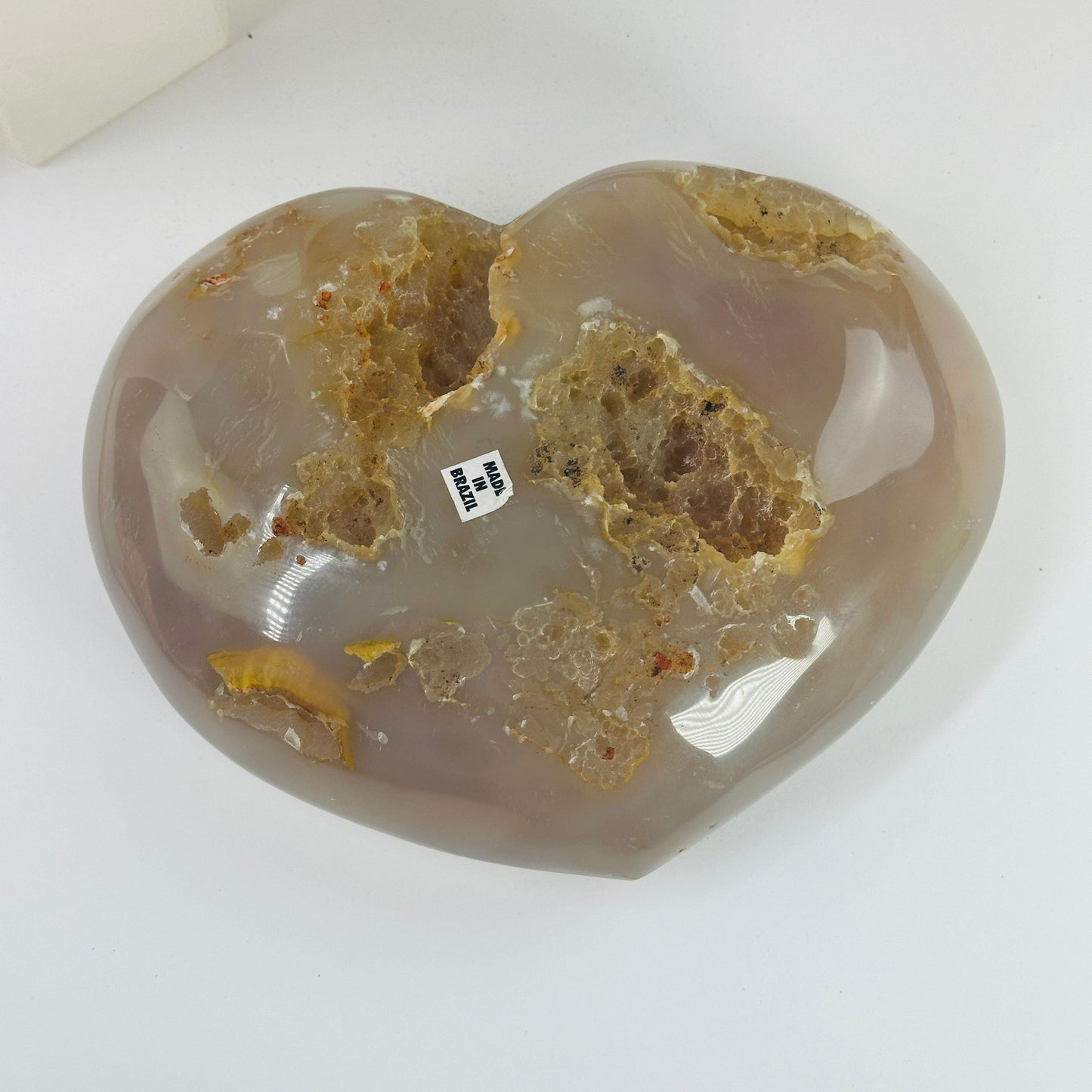agate heart with decorations in the background