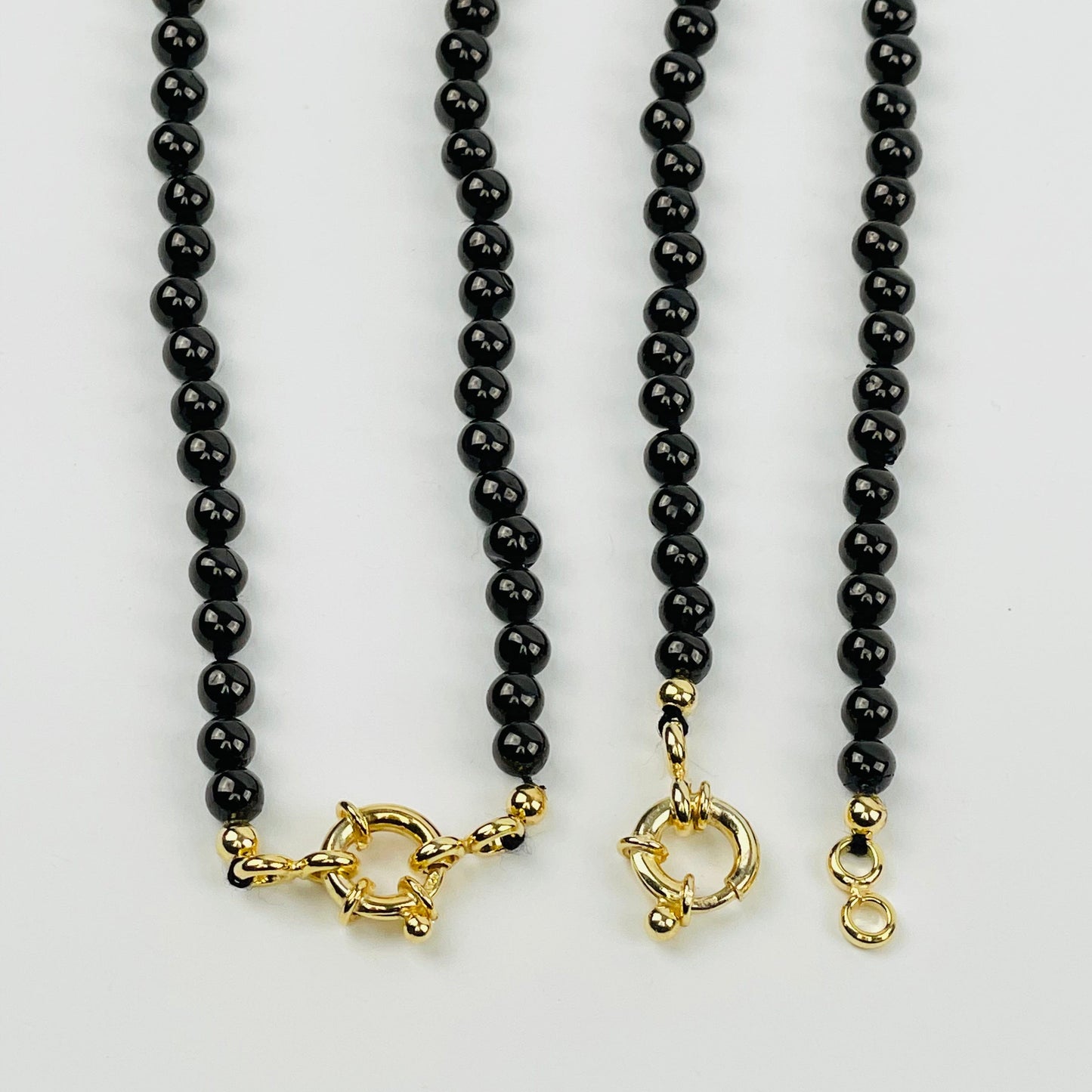 up close shot of clasps on 2 Shungite Candy Necklaces