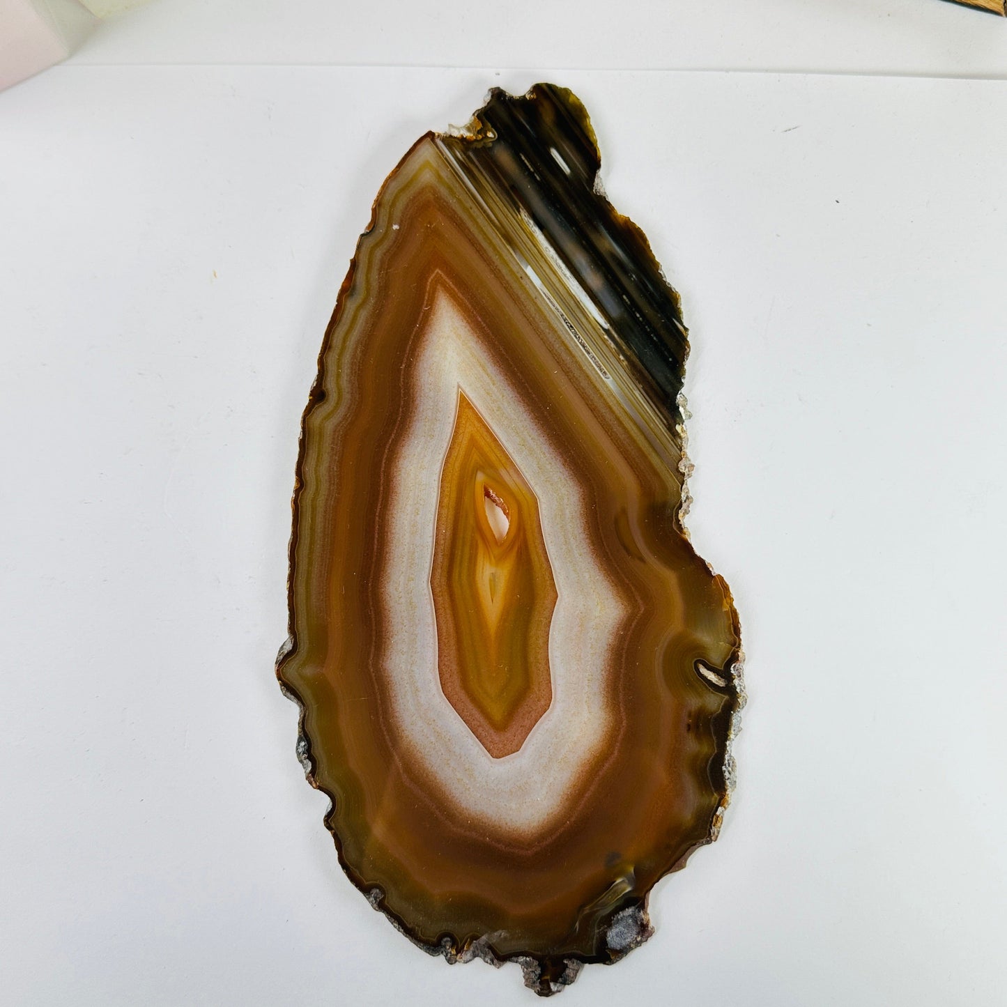agate slices with decorations in the background