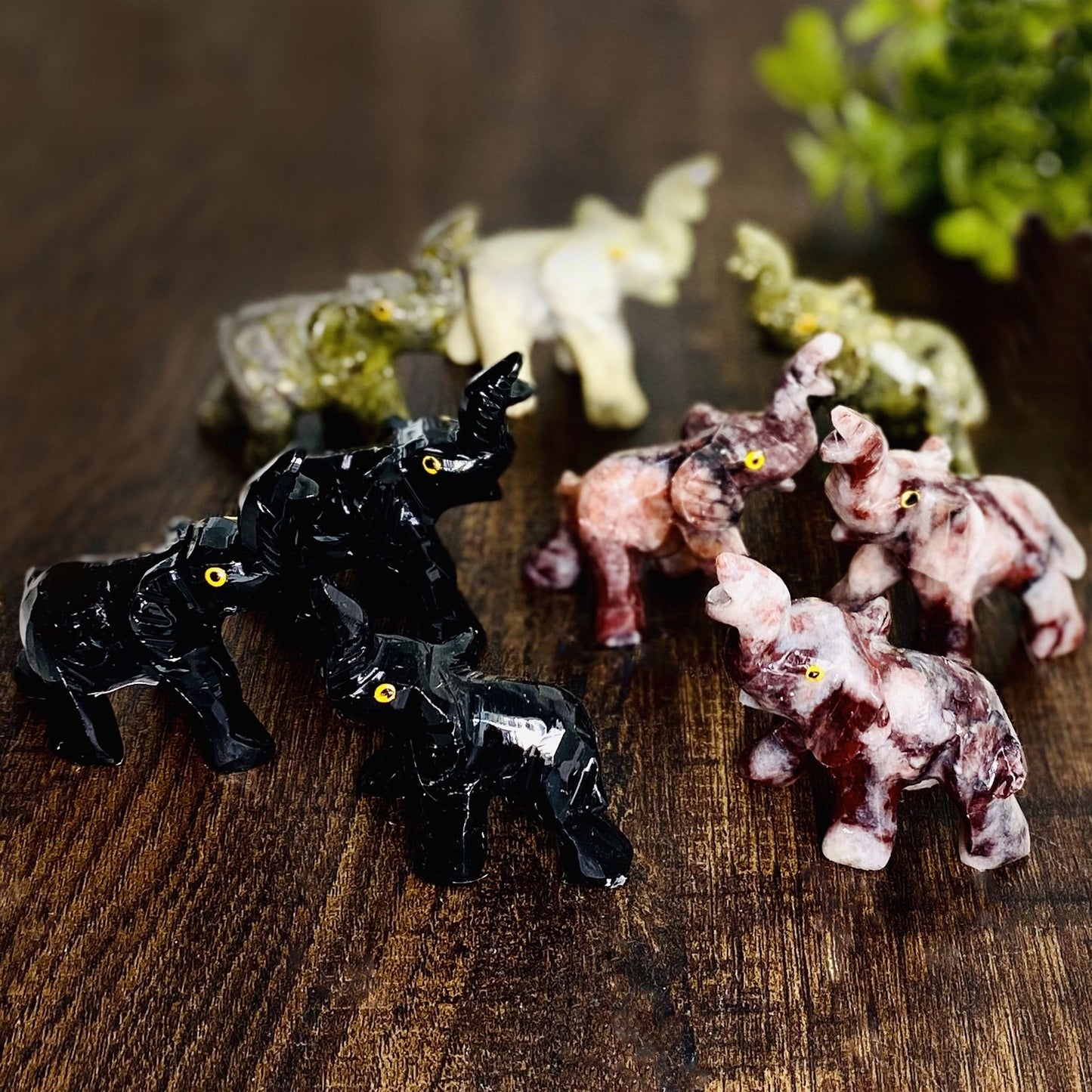 Elephant Shaped Mini Statues displayed next to each other showing different stones