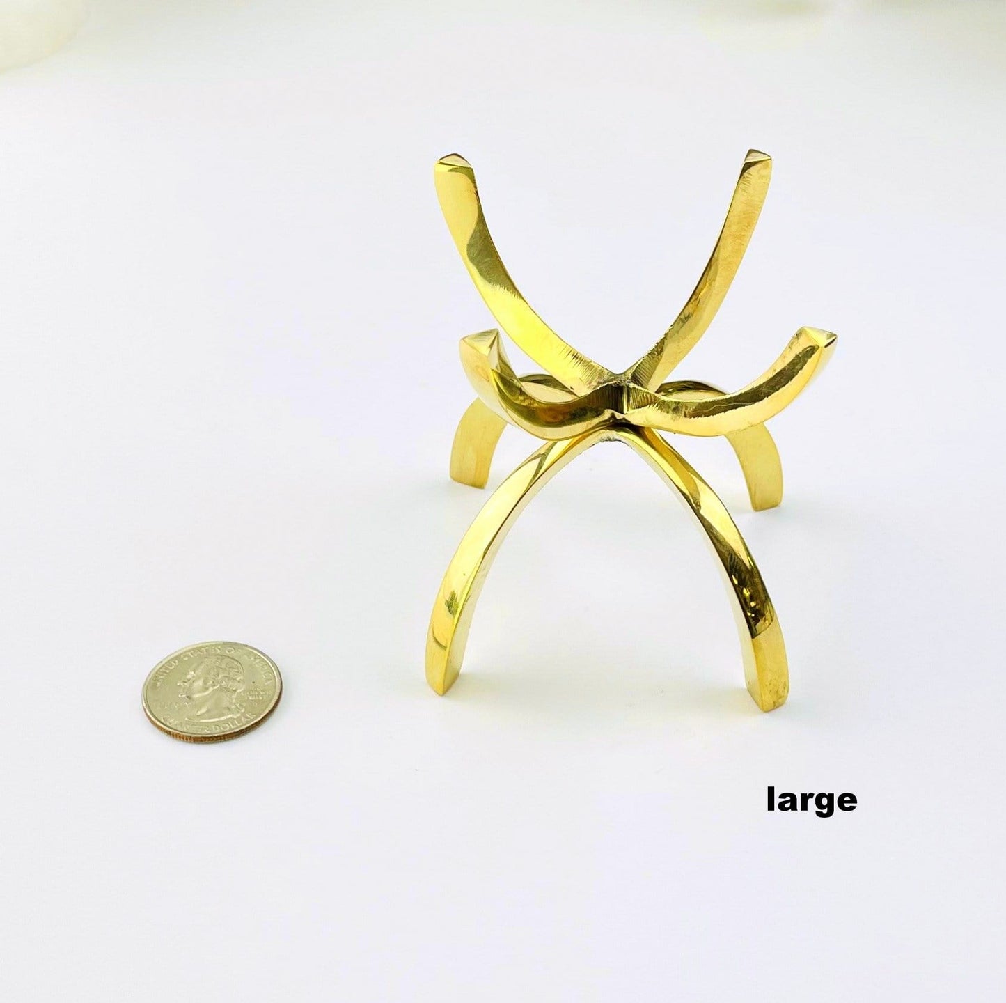 large stand next to a quarter