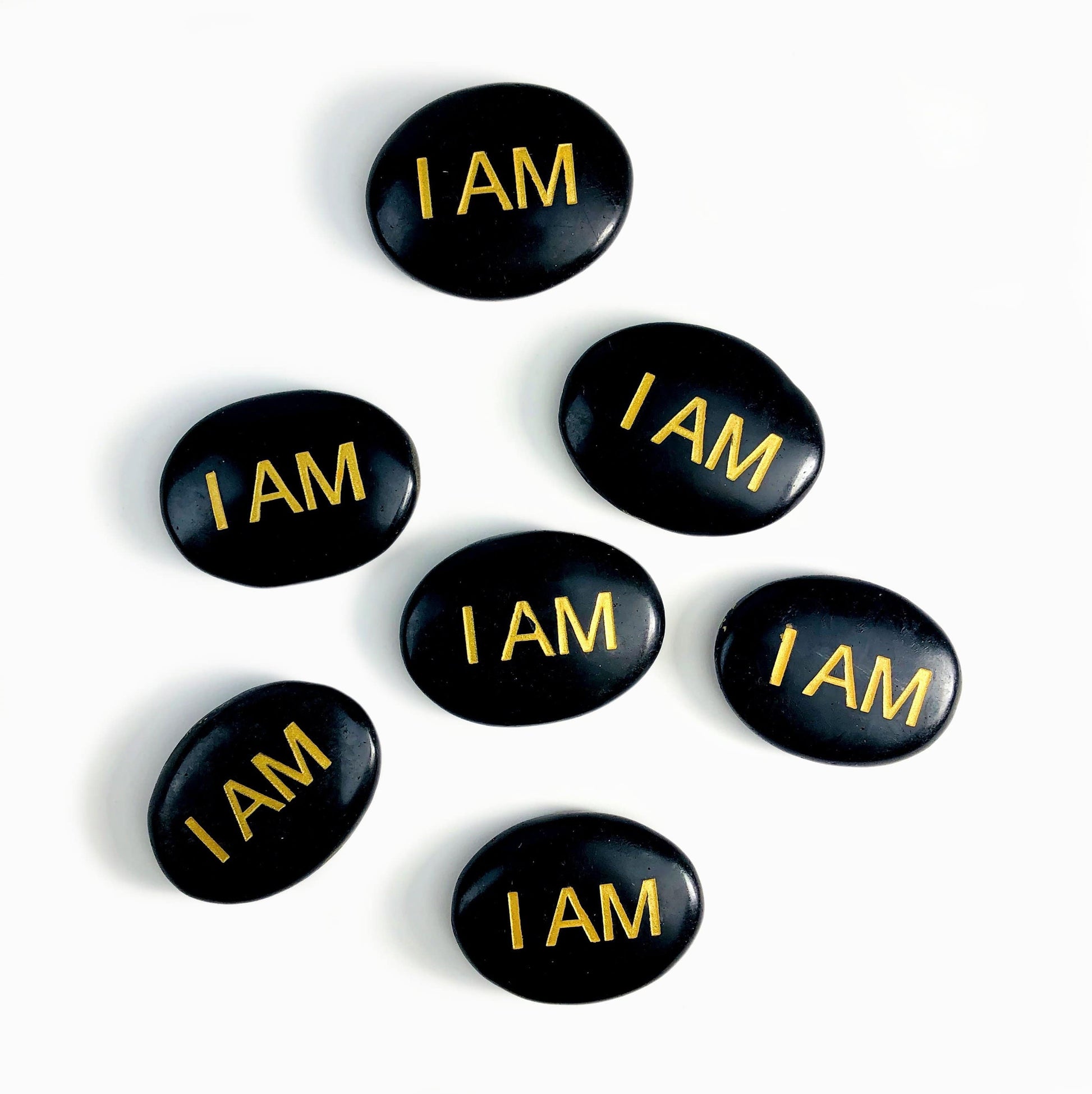 i am obsidian stones on a table