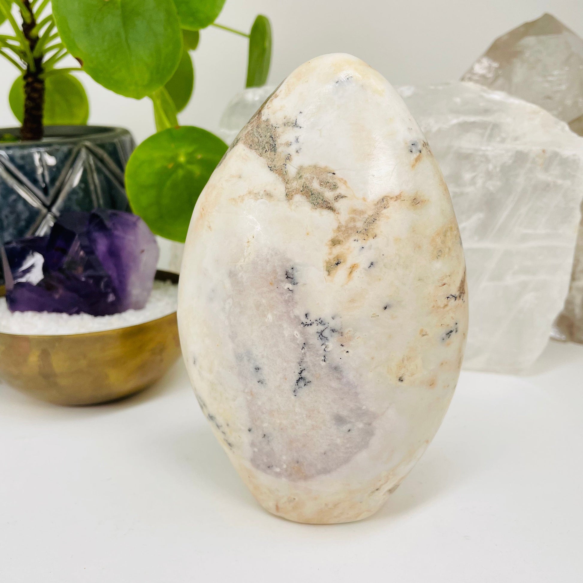 dendritic opal cut base displayed as home decor
